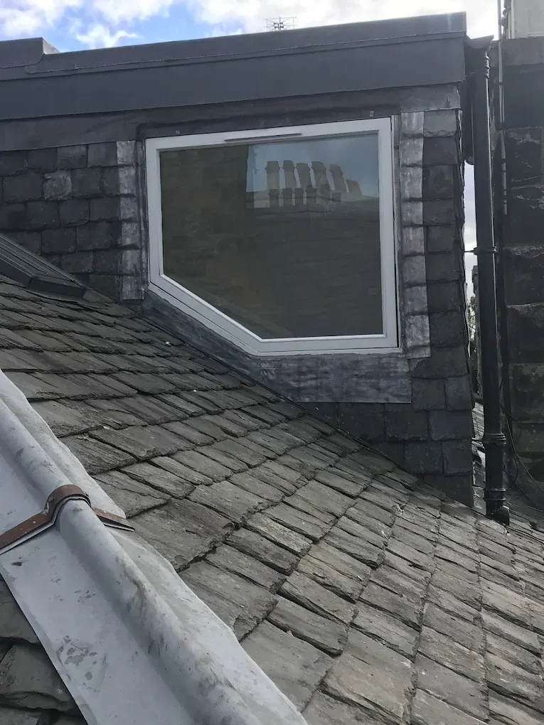 Professional slate roofing and leadwork installation by Gordon Gardiner Slater & Plasterer.