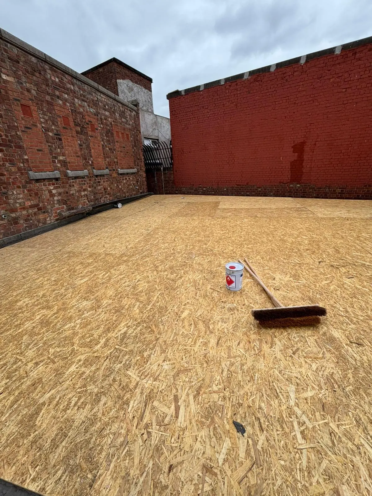 New OSB timber decking installed on a flat roof project, prepared for a weatherproof system