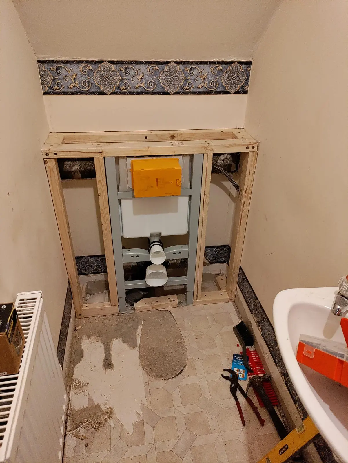 Concealed toilet cistern and frame installation in a Frome home by BC Plumbing.