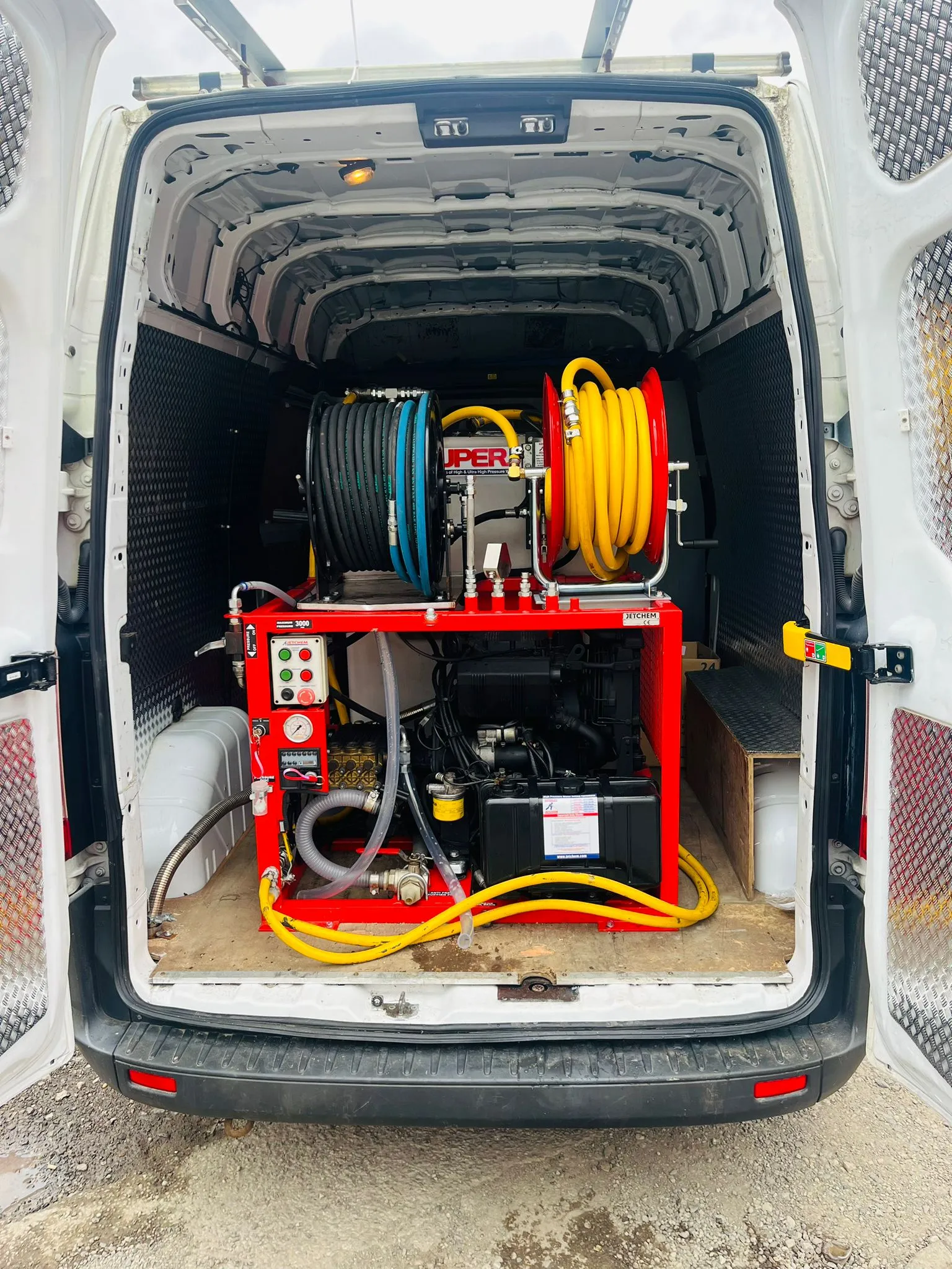 High-pressure water jetting equipment in Go Flow Solutions van