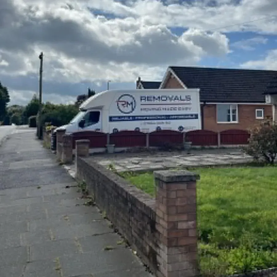 RM Removals Luton van parked outside a residential home in Carlisle for a house removal