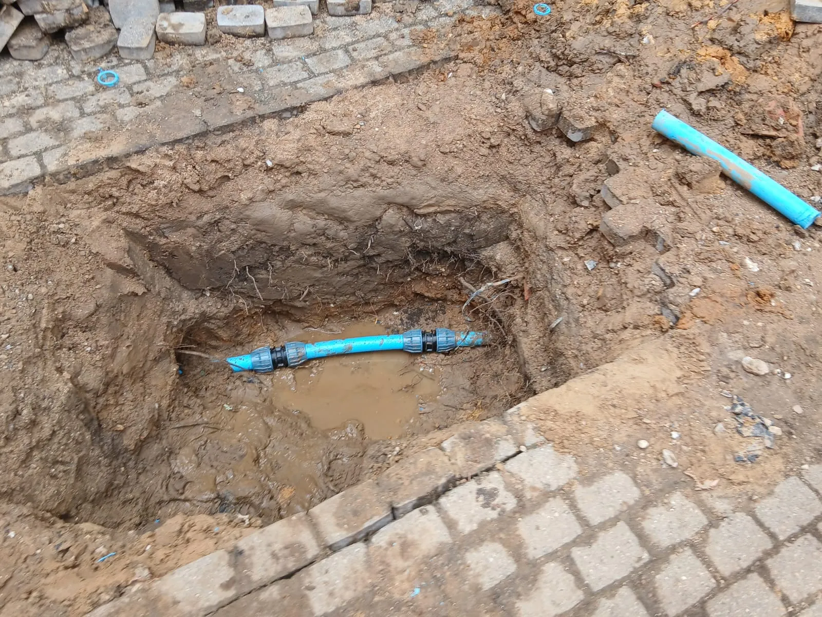 Underground pipe repair and excavation work being carried out by Roberts Drainage Ltd.