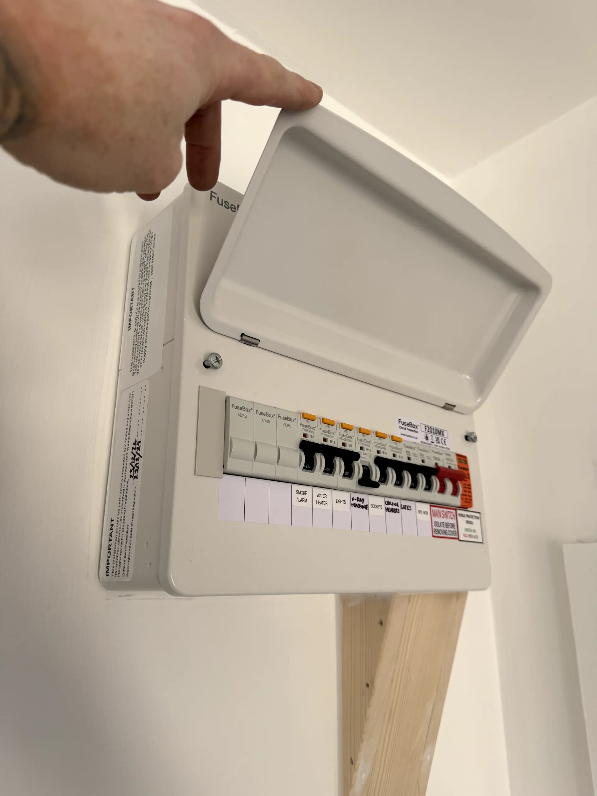 A newly installed 18th Edition compliant FuseBox consumer unit showing RCBOs and surge protection