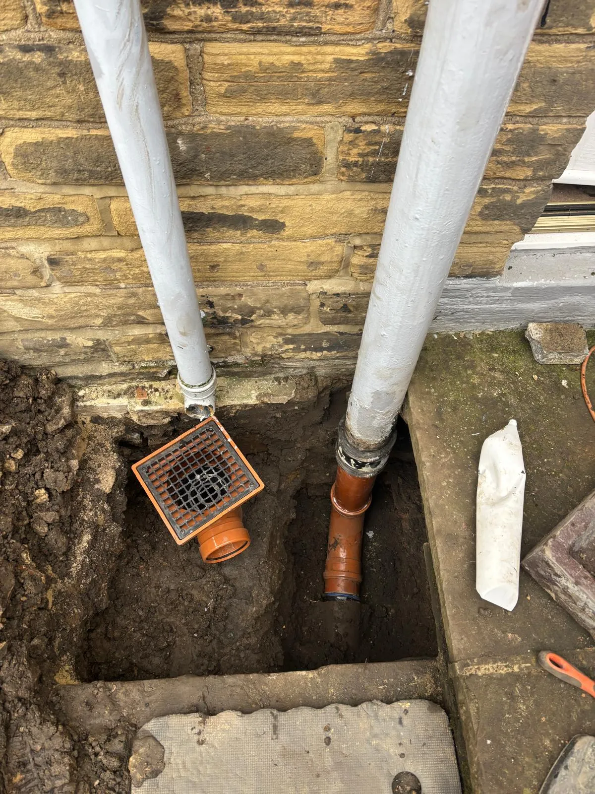 Drainage repair and new pipe installation at a residential property in Leeds.