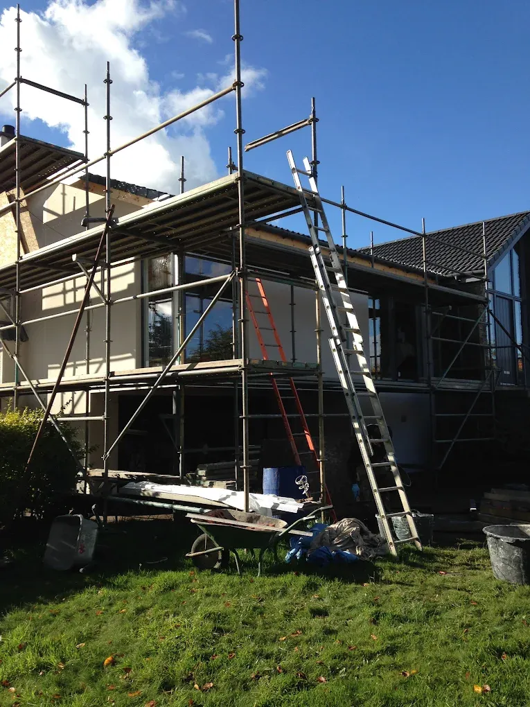 Scaffolding and construction equipment at a house in Lanark for external roughcasting and rendering work