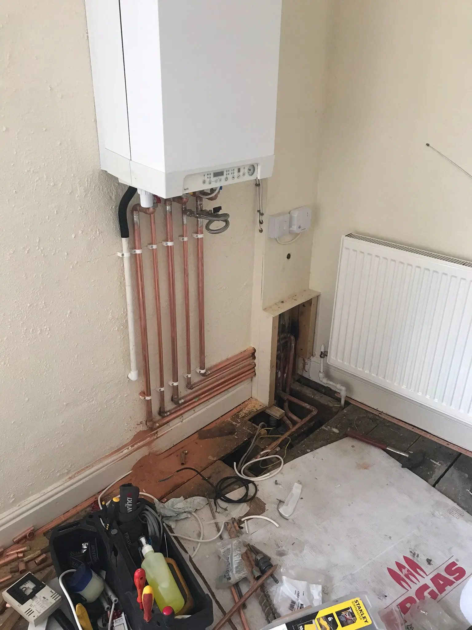 Expert boiler installation in Wolverhampton featuring new copper pipework and Gas Safe engineering by Fact Services.