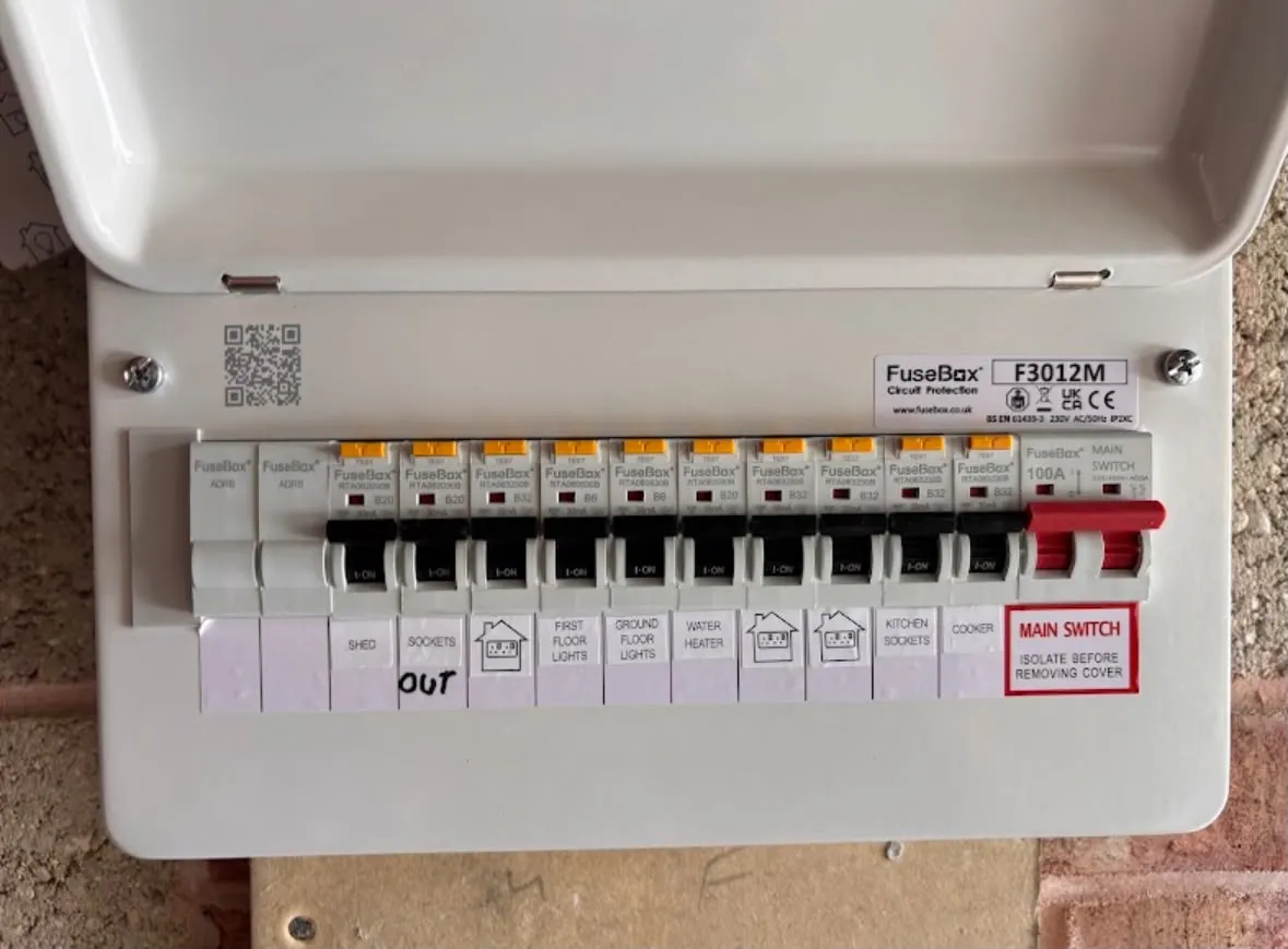 Modern metal-clad RCBO consumer unit upgrade installed in a residential property