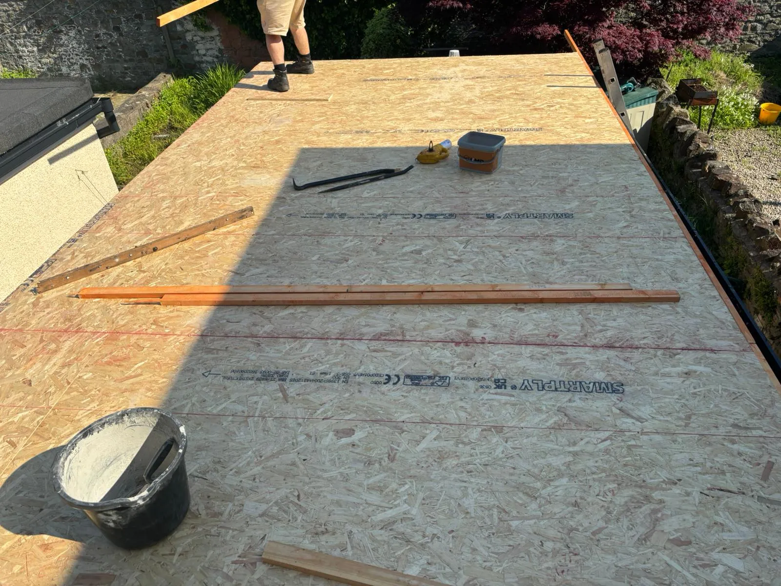 OSB boarding being installed for a new flat roof by PRS Roofing