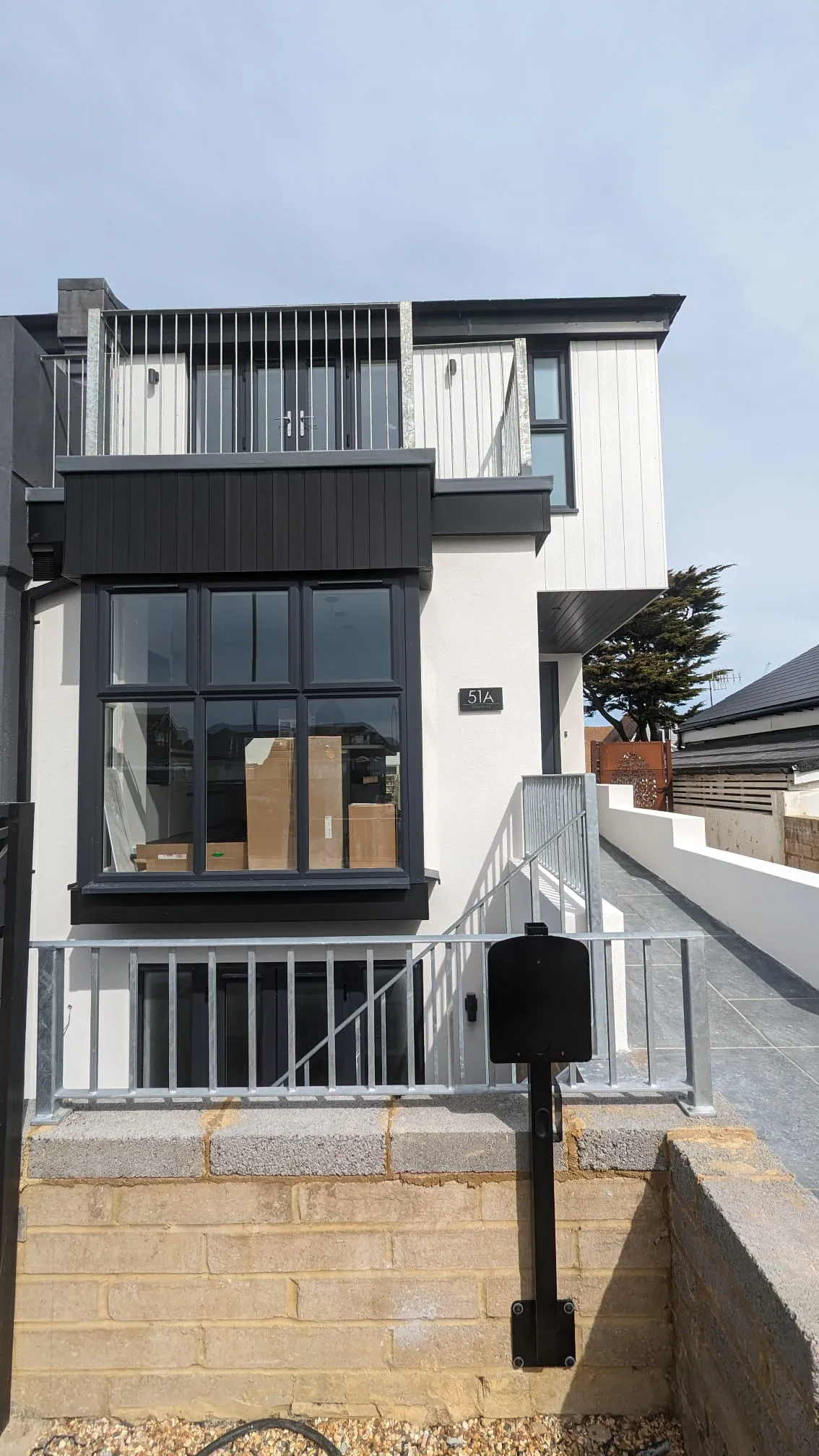 Professional external rendering on a contemporary house in Portslade by Portslade Plastering.