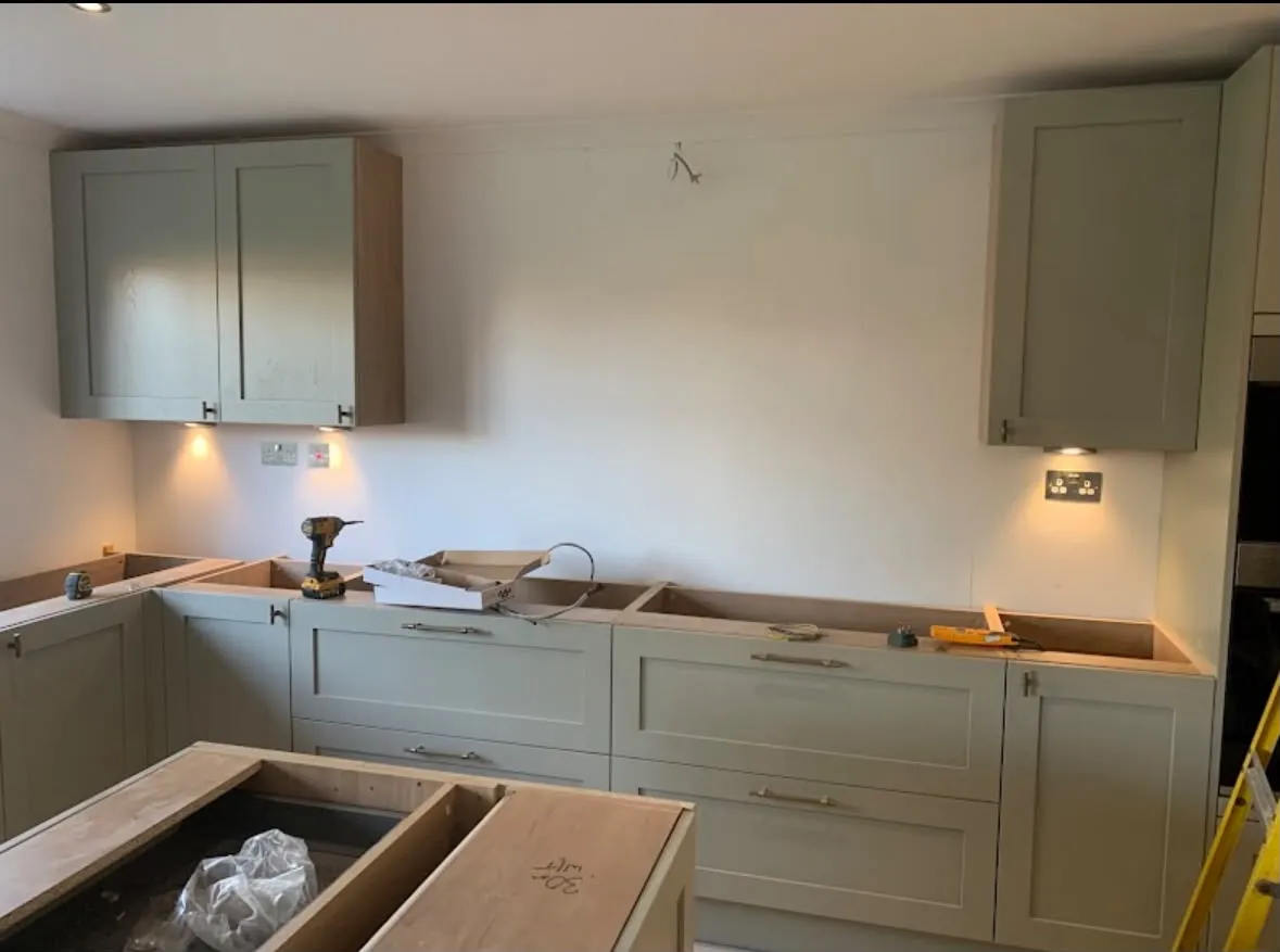 Kitchen circuit upgrade and under-cabinet lighting installation during a home renovation