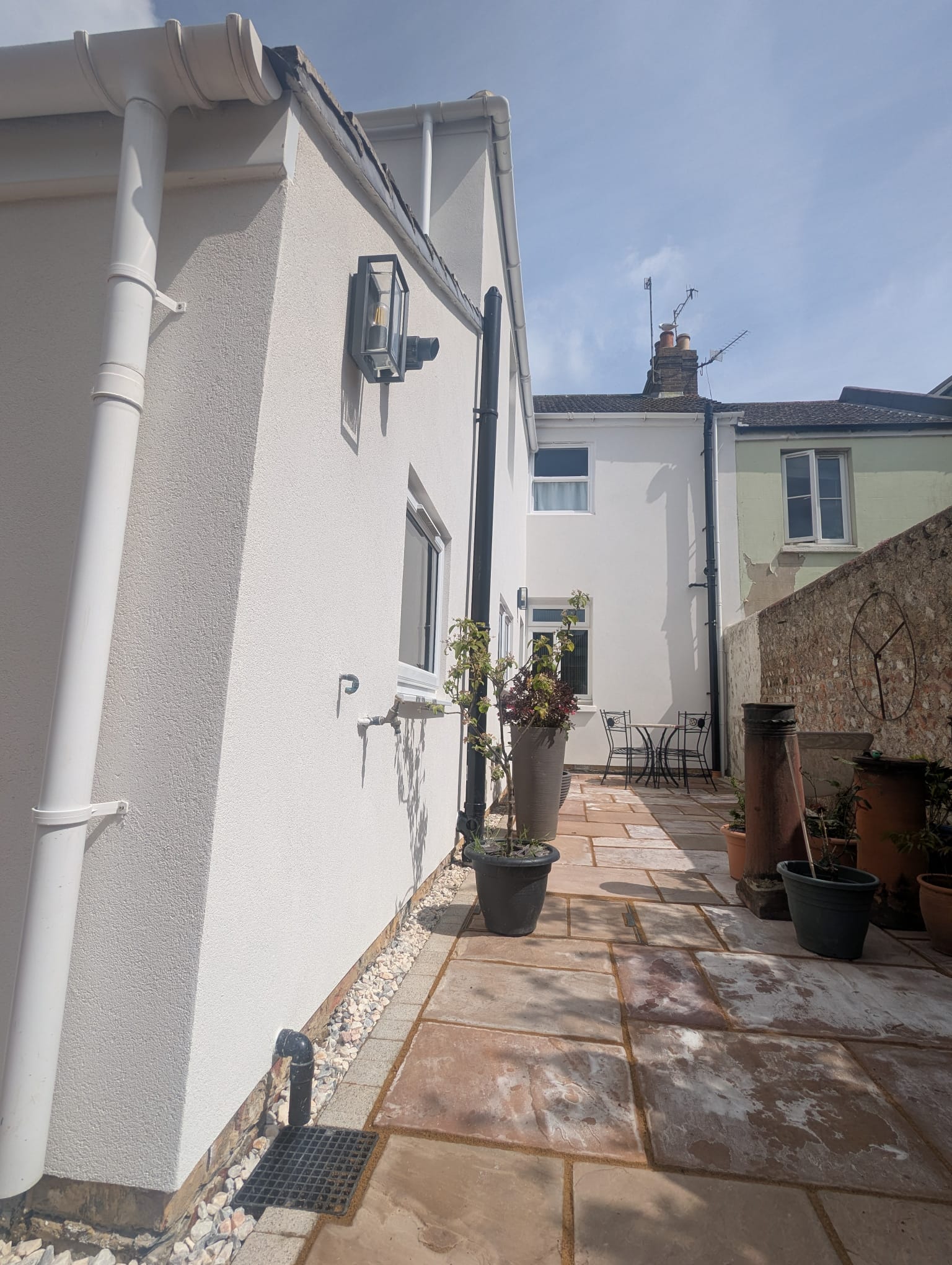 High-quality white external render on a house in Portslade.