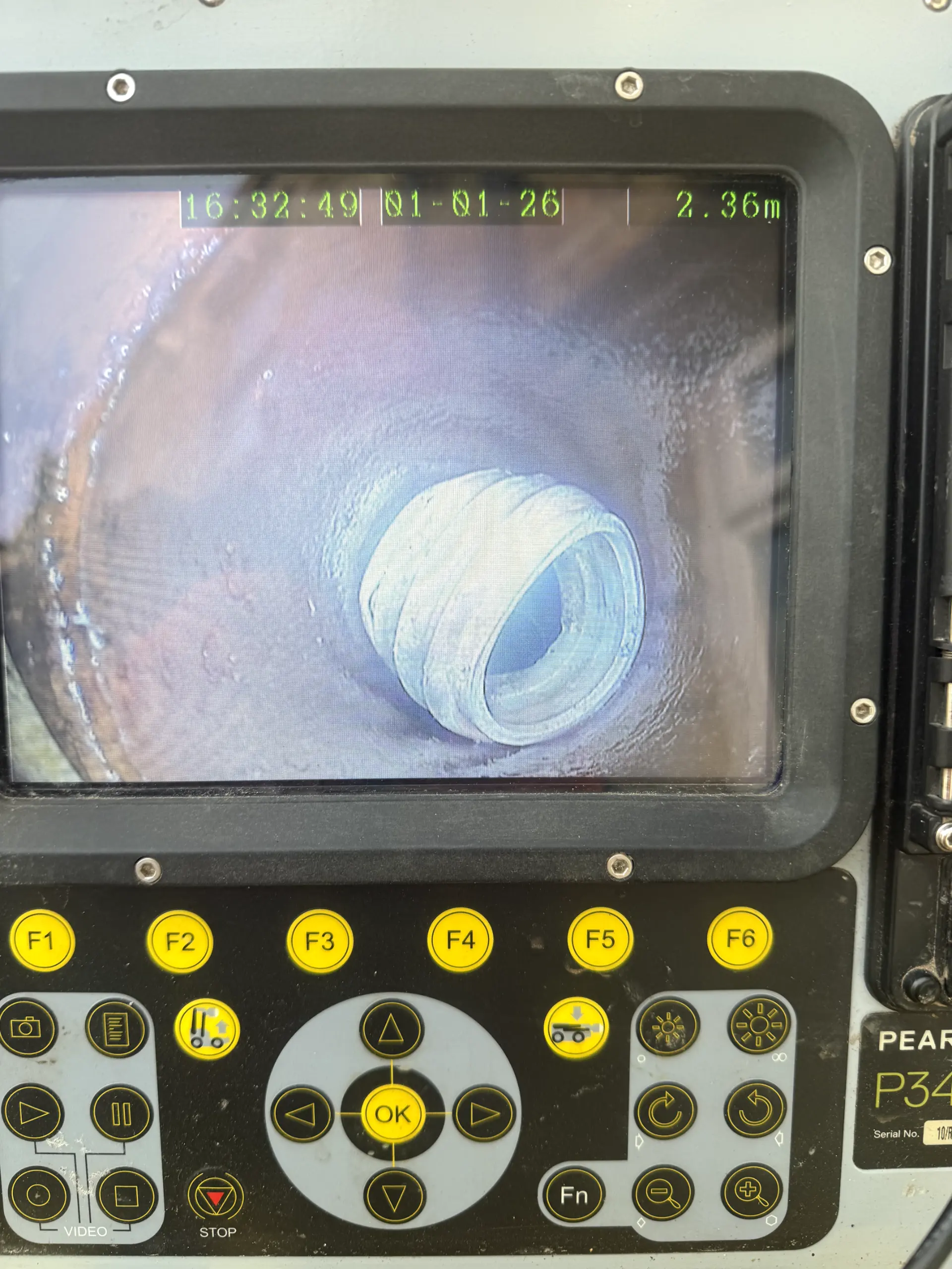 CCTV drain survey monitor showing an internal pipe inspection by WGS Services in Darwen