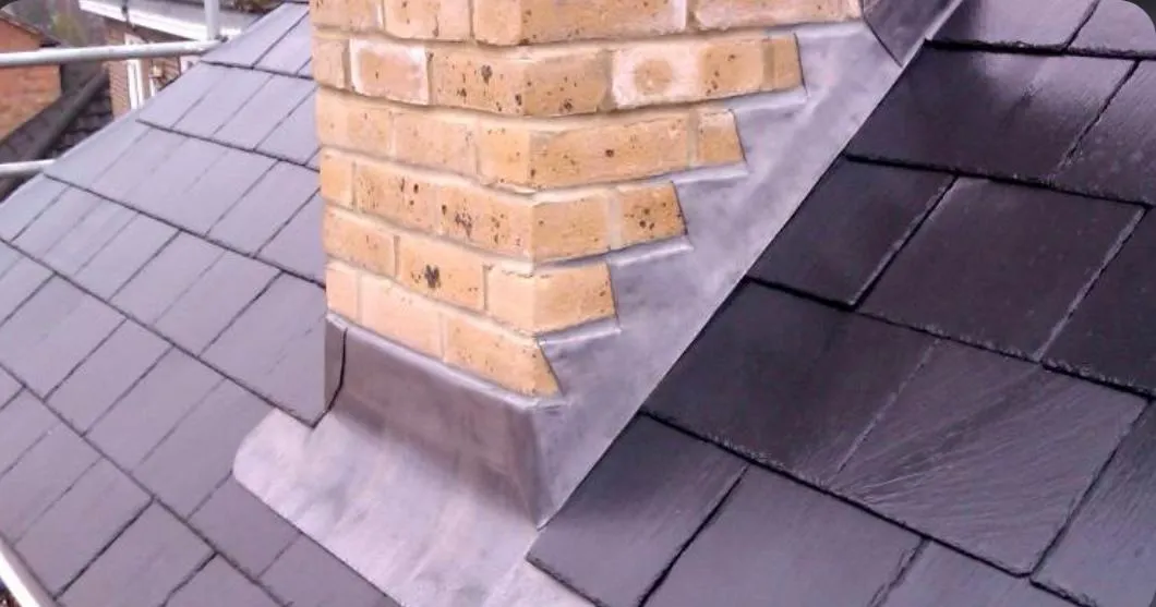 Professional lead flashing and chimney leadwork on a slate roof in Devon and Cornwall.