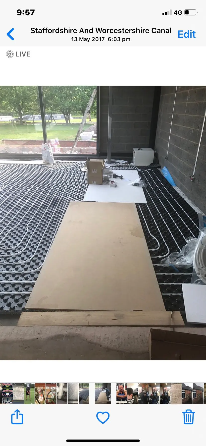 Expert underfloor heating installation in Wolverhampton showing white heating pipes laid into black floor panels by Fact Services.