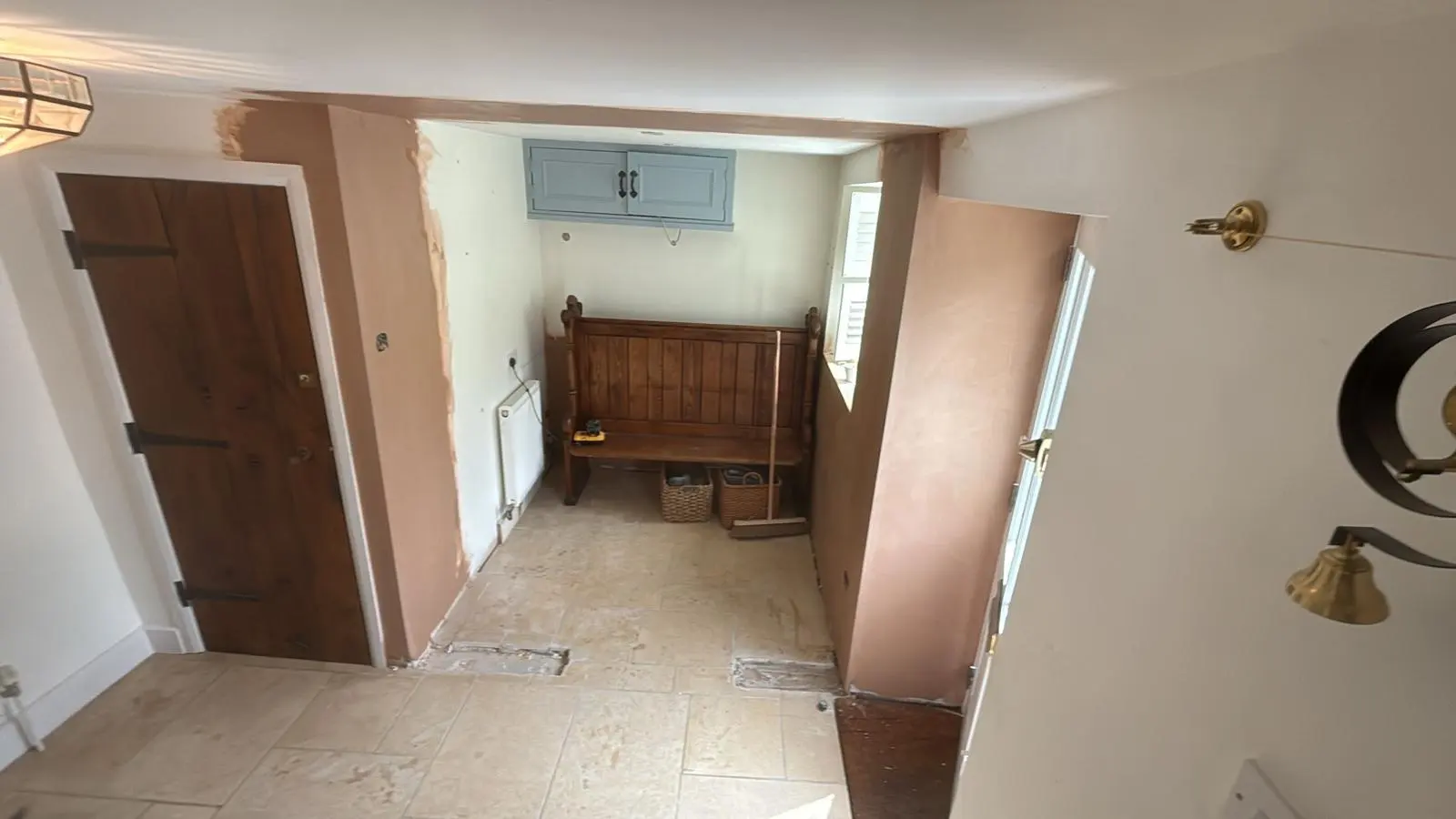 Ongoing high-end house renovation in Tetbury showing newly plastered walls and structural alterations by Fortura Construction LTD.