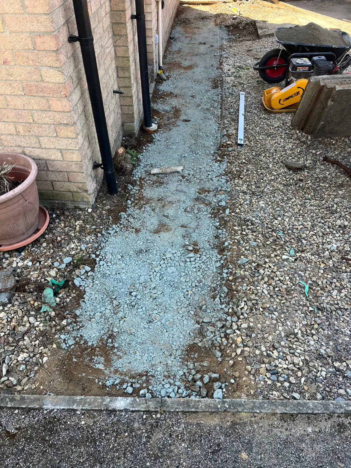 Expert groundworks and sub-base preparation for a patio or driveway in Felixstowe by FLEX PROPERTY SERVICES.