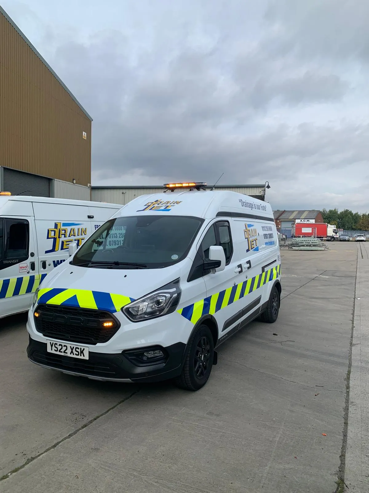 Drain Jet service vehicle with branding and emergency lighting in Leeds