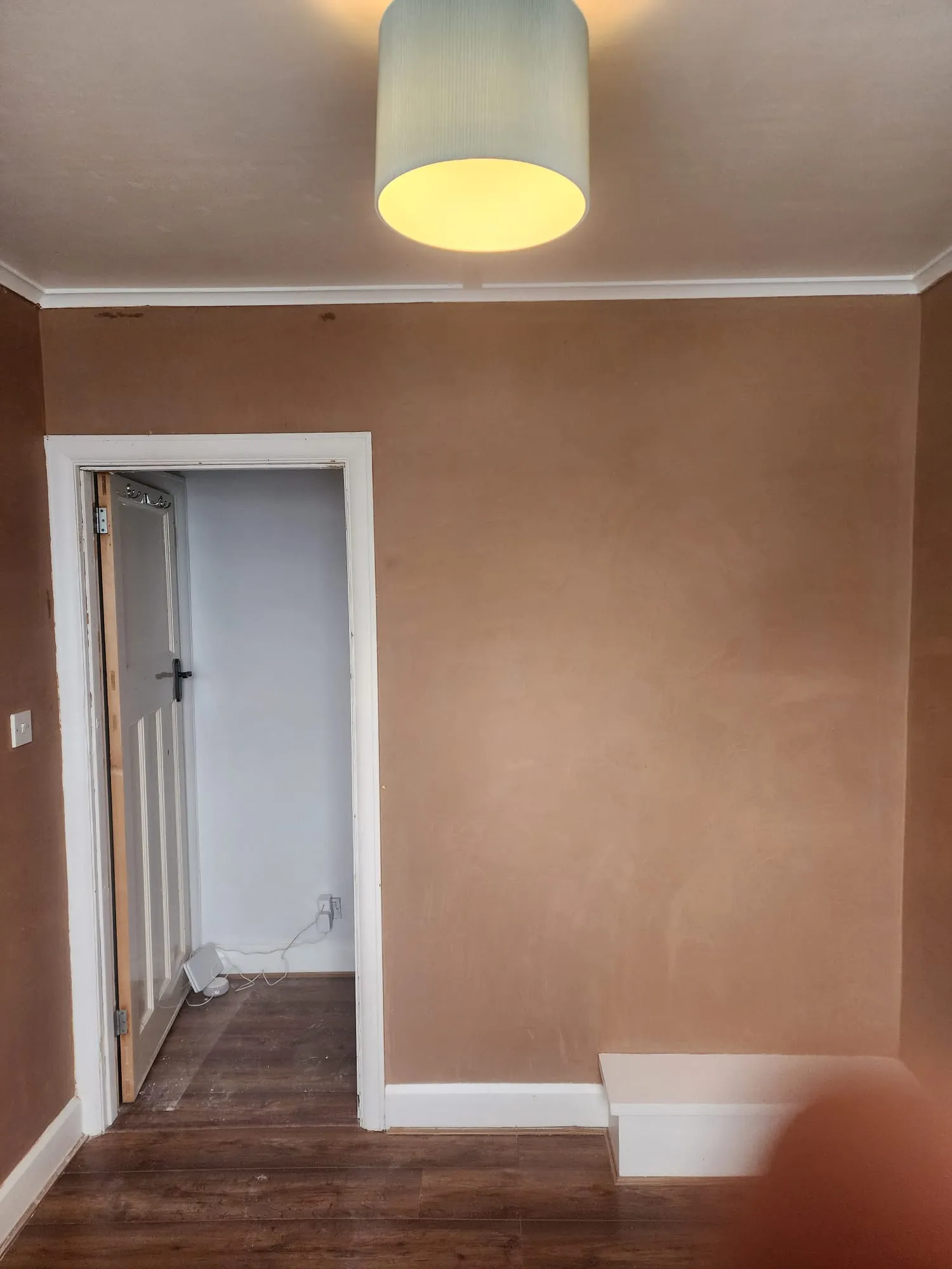 High-quality internal plastering and skimming on a room wall in a Southwick home.