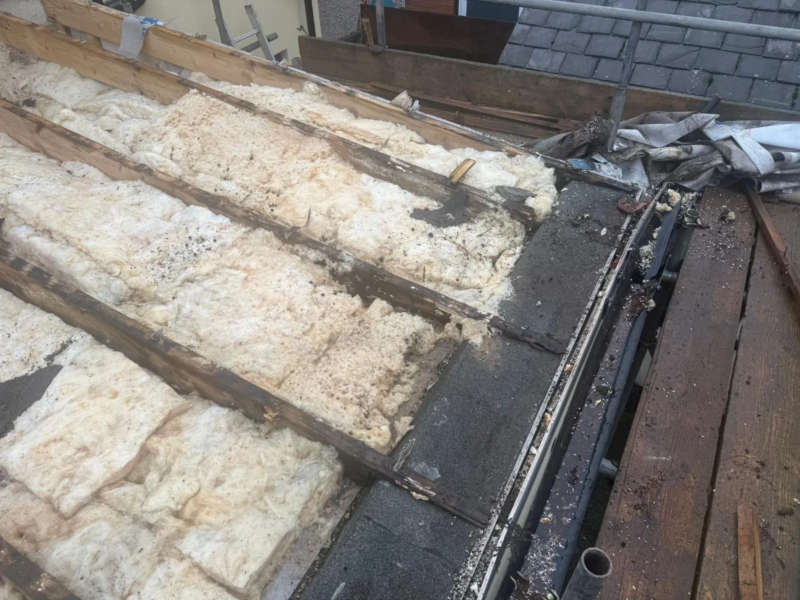 Roof insulation and rafters exposed during a roofing project in Aberdeenshire