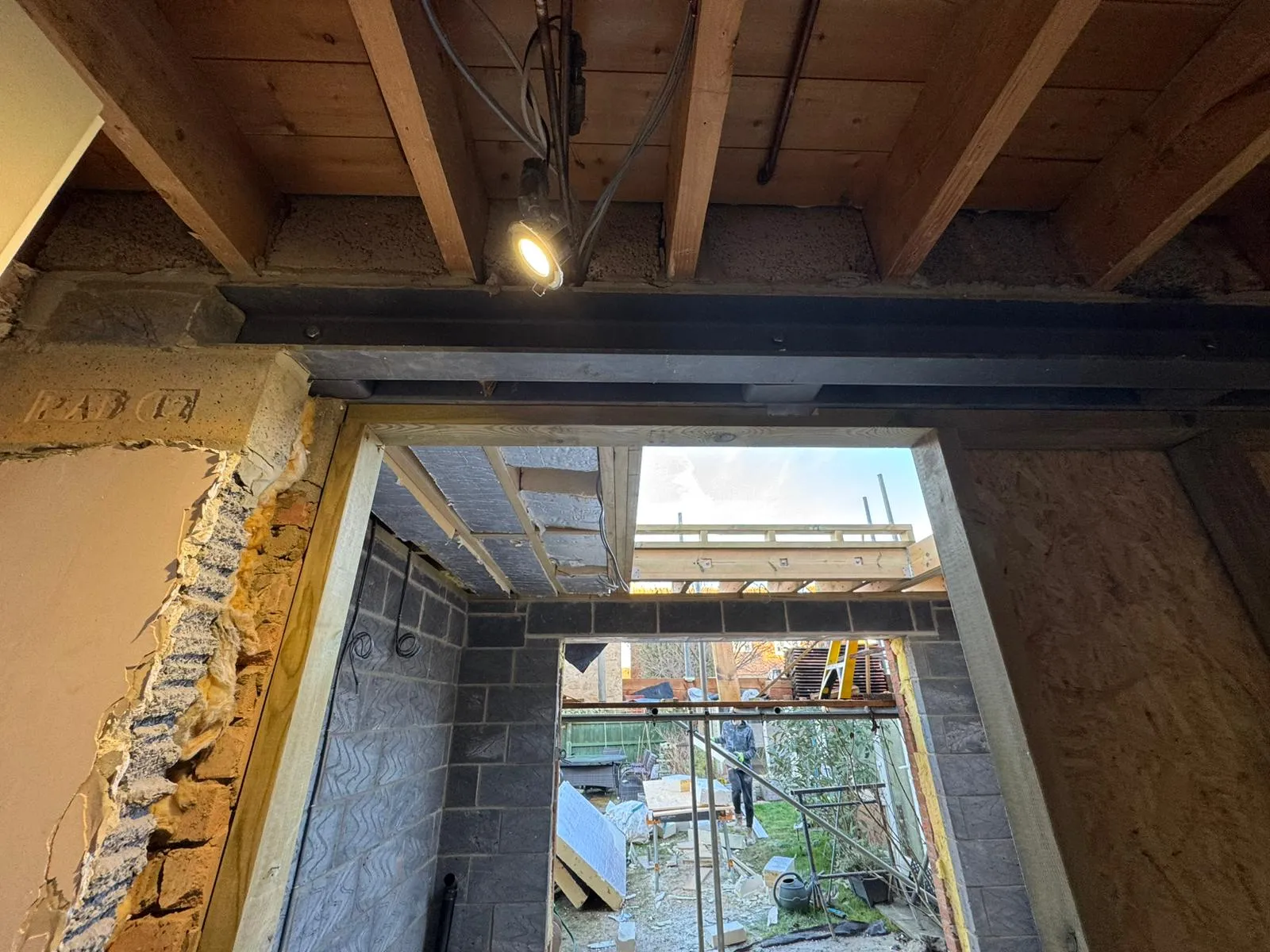Structural renovation and building services in Felixstowe showing steel beam installation and timber joists by FLEX PROPERTY SERVICES.