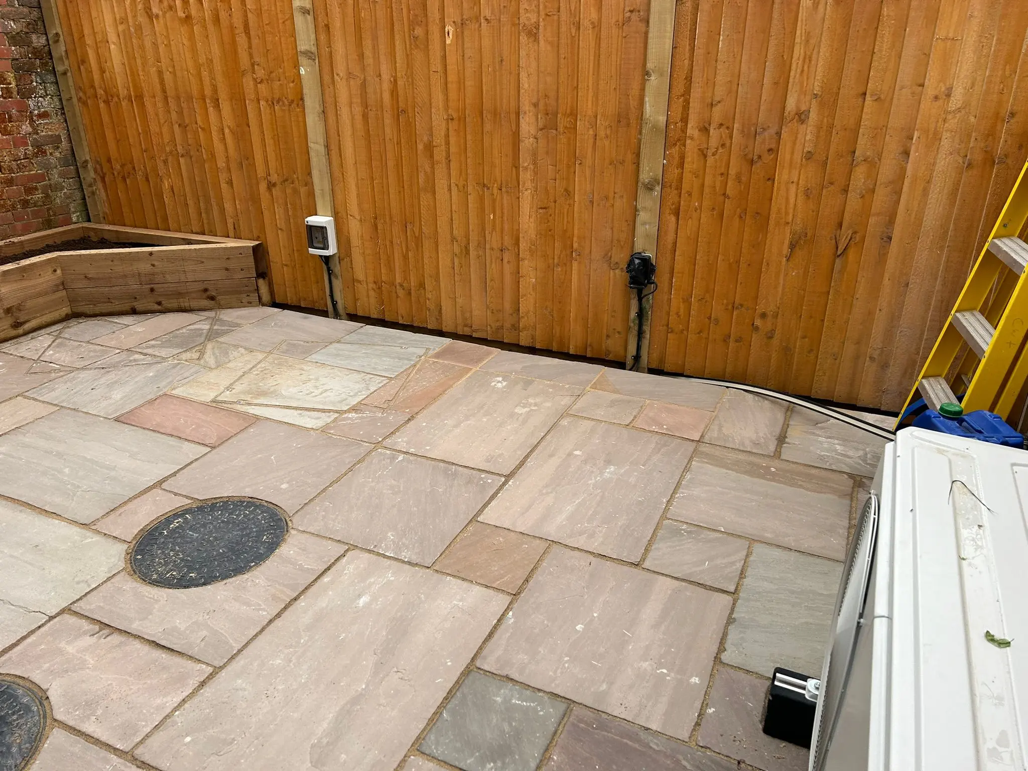Expert sandstone patio installation by Aline Construction in Southampton