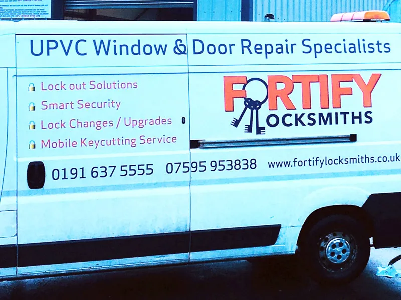 Fortify Locksmiths service van with company logo and contact information