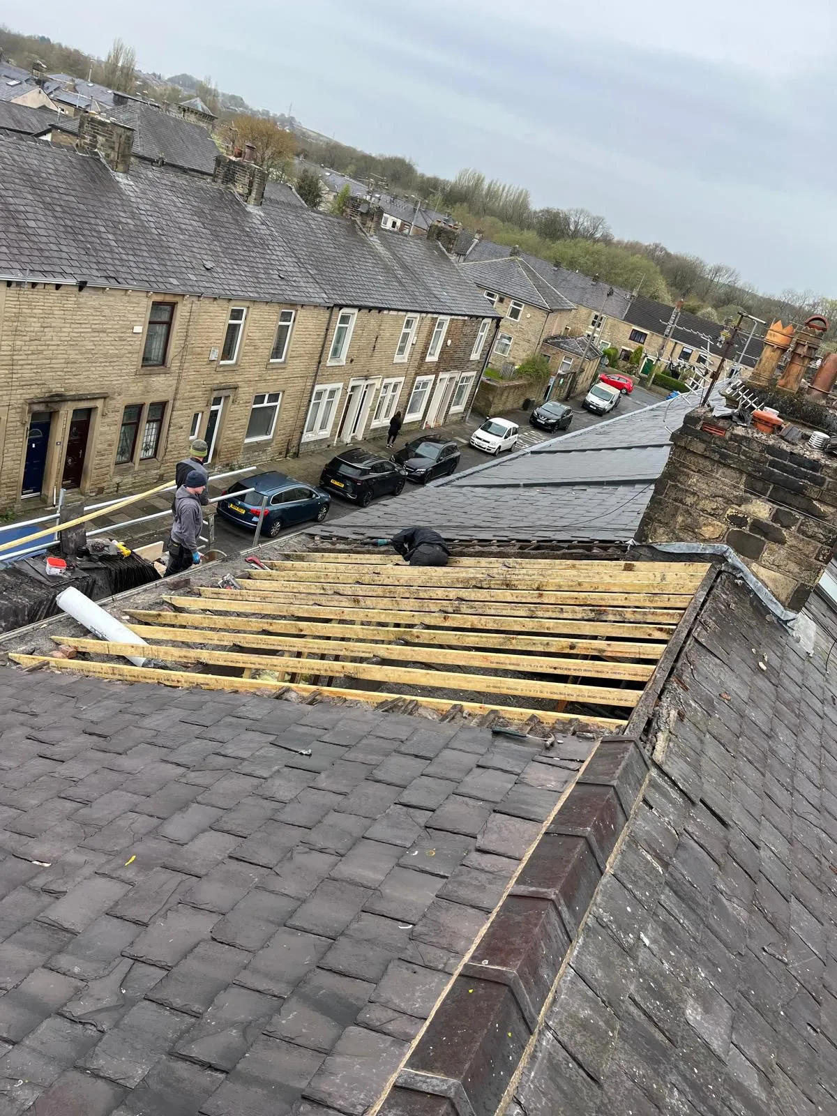Expert roofers performing a new roof installation and structural timber repairs in Blackburn, Lancashire.