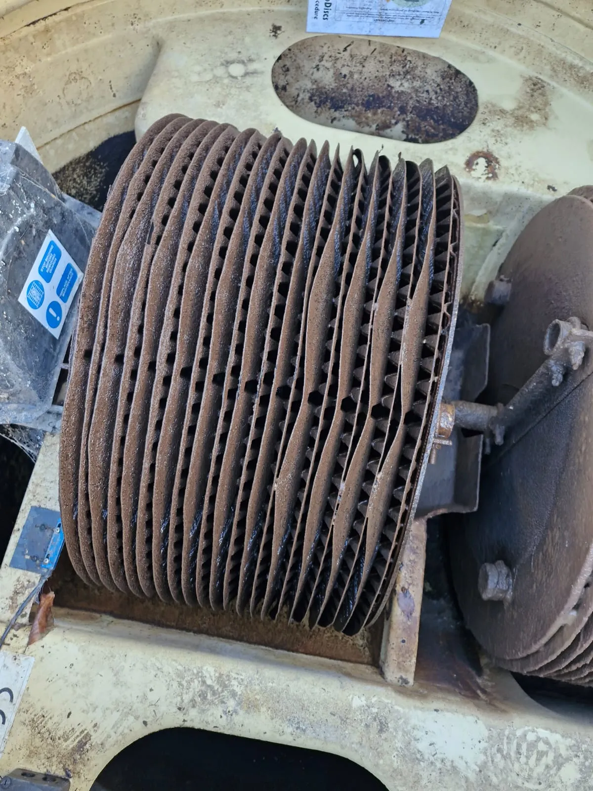 Rotating biological contactor (RBC) discs inside a wastewater treatment plant for sewage processing.