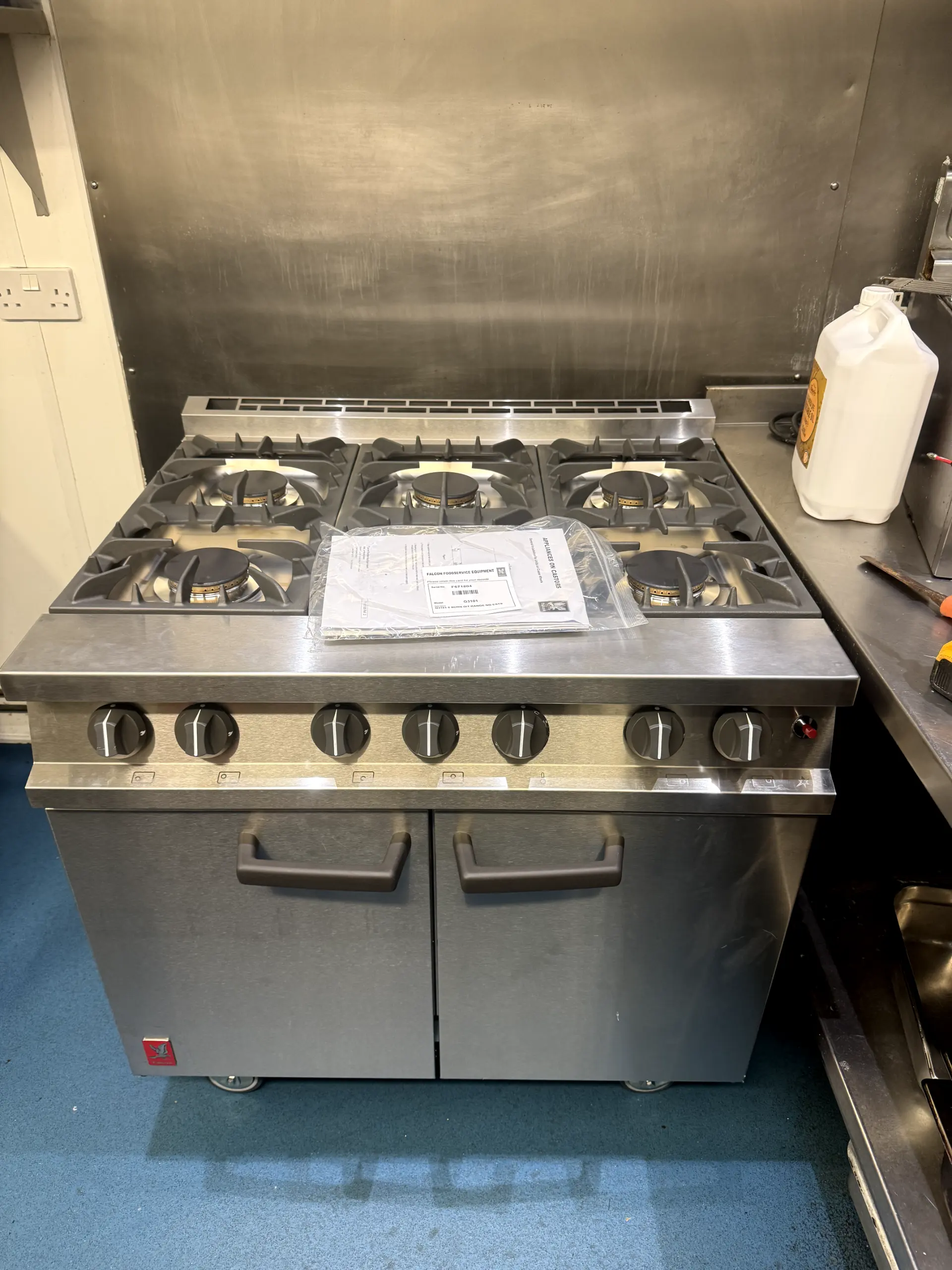 Falcon commercial gas range installation in a professional kitchen by WGS Services