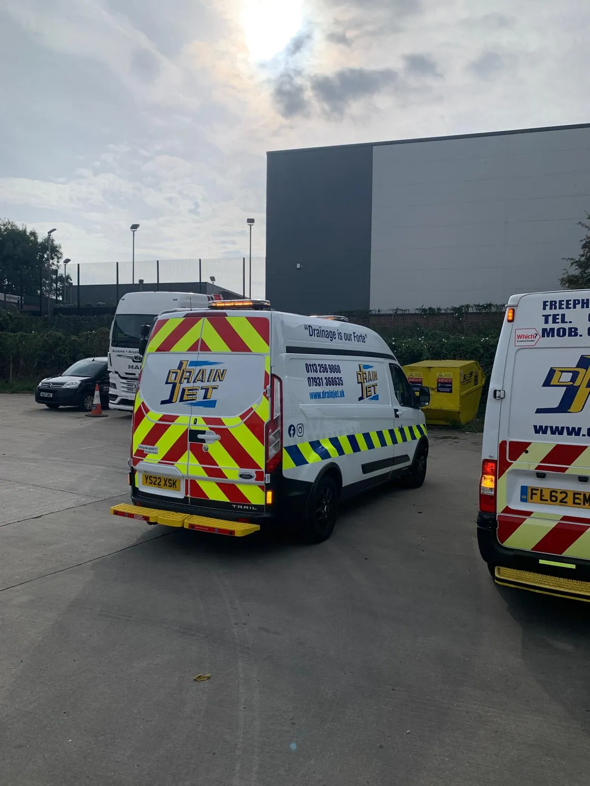 Drain Jet service vans parked and ready for commercial drainage services in Leeds