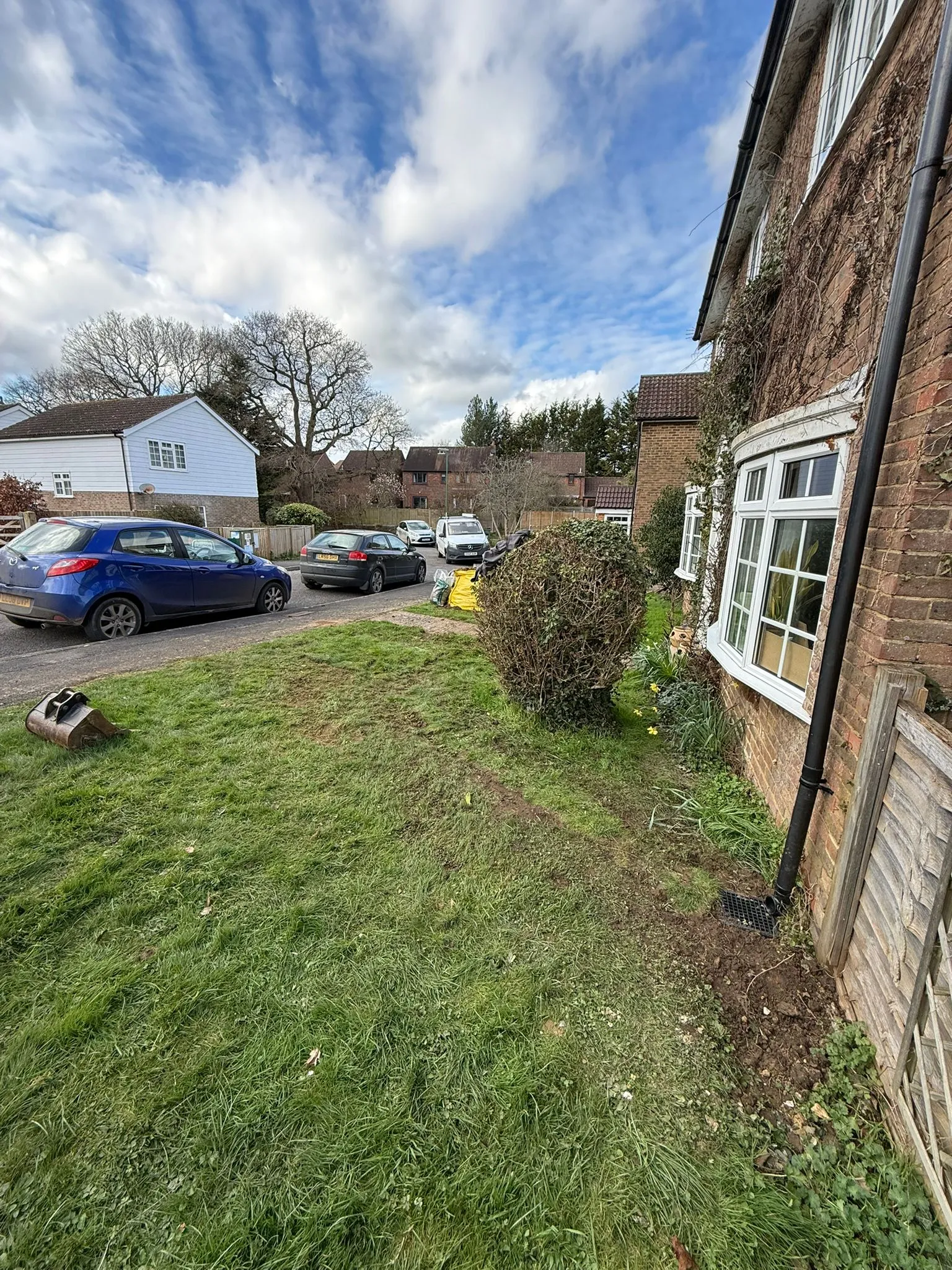 Drainage installation and repair work being carried out at a home in Bournemouth by Drainage South Ltd.