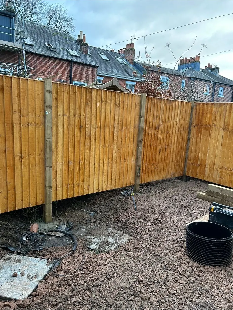 A picture of a new wooden garden fence installation