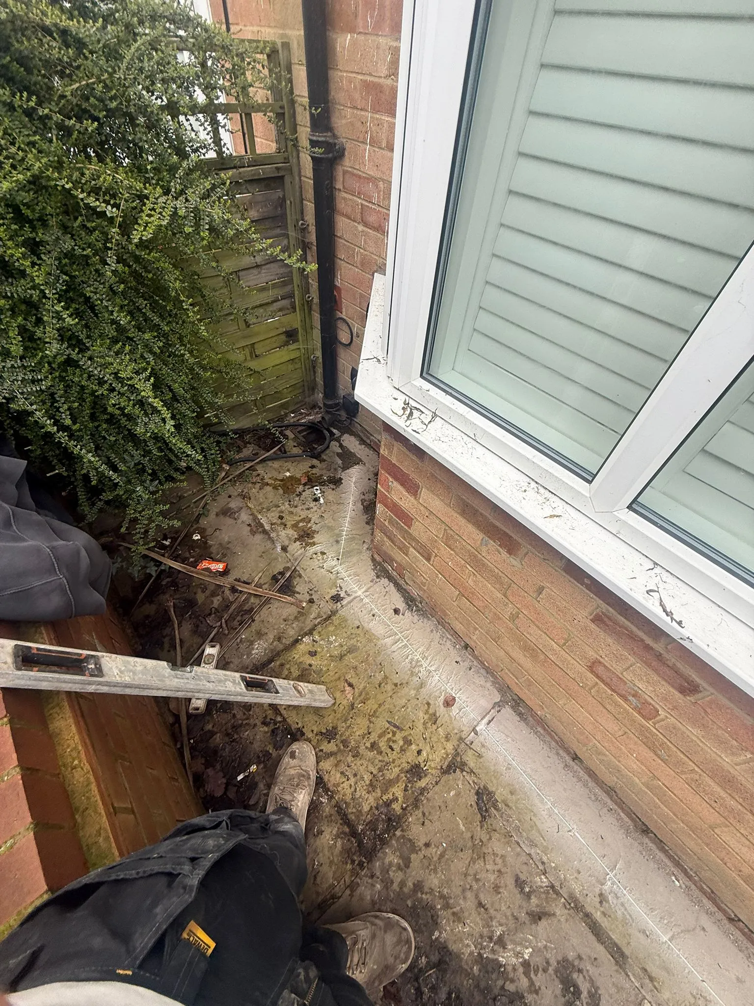 A drainage engineer preparing for a drain installation or repair service in Bournemouth.