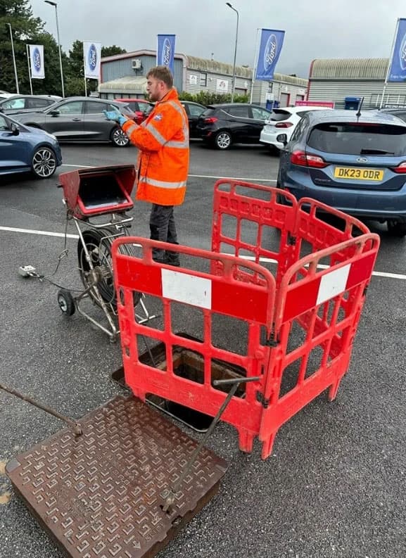 Drain Medics engineer conducting a professional CCTV drain survey on a commercial property