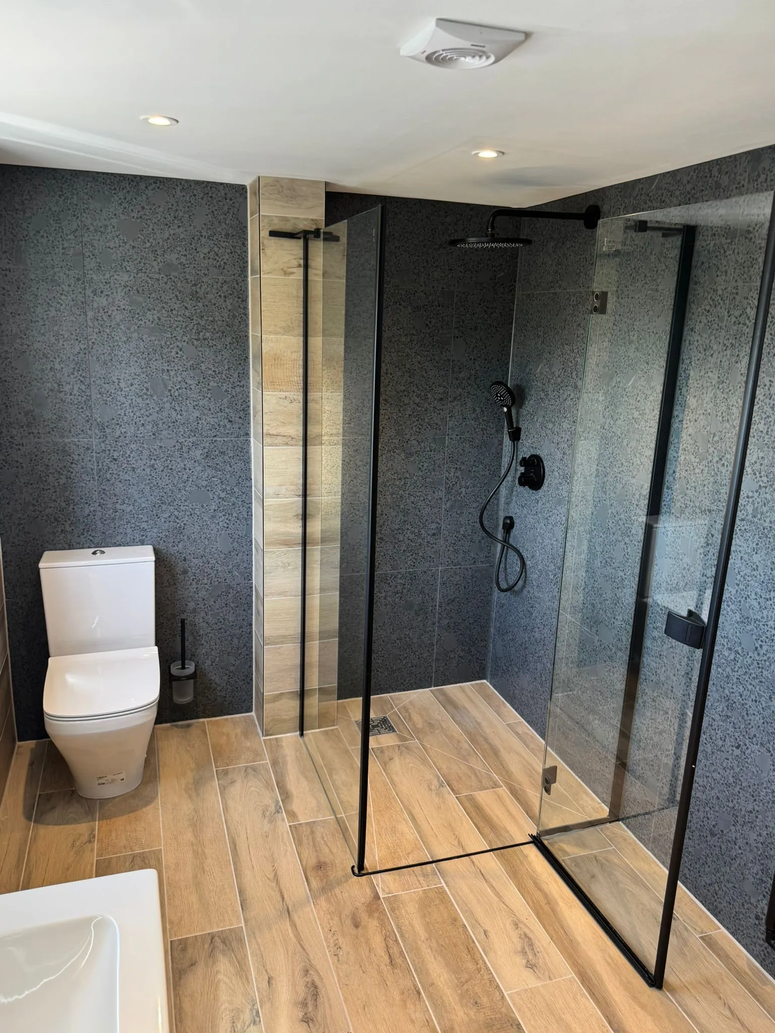 Modern walk-in shower and bathroom installation in Warrington by Redorr Heating & Cooling Services Ltd.