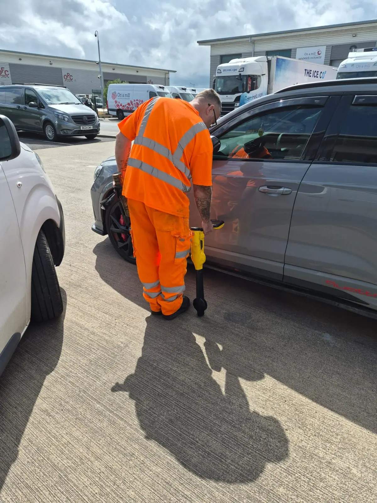 APJ Drainage engineer using a CAT scanner to trace underground drainage pipes in a commercial car park