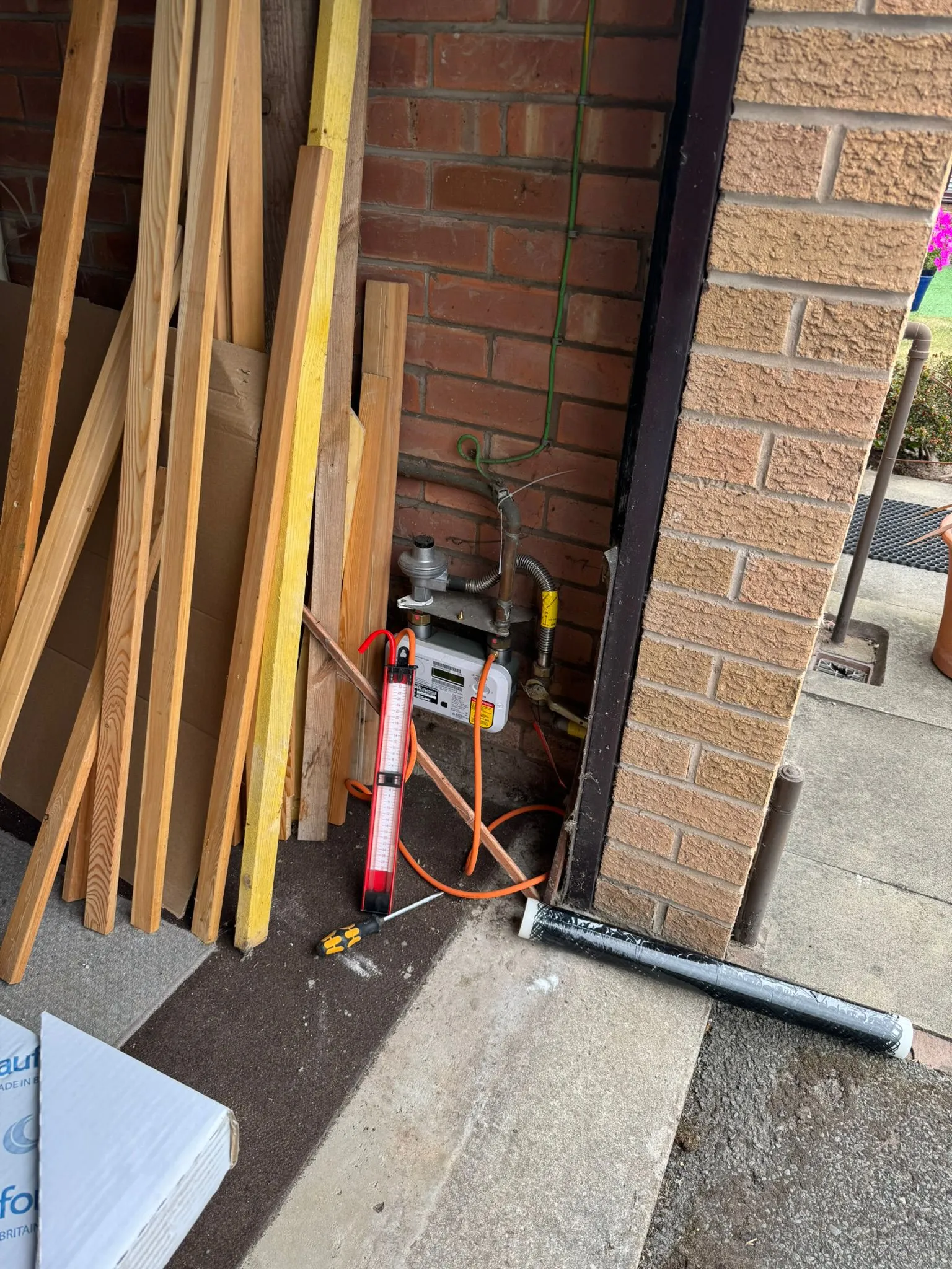 A gas meter installation undergoing a safety check by Redorr Heating & Cooling Services Ltd.