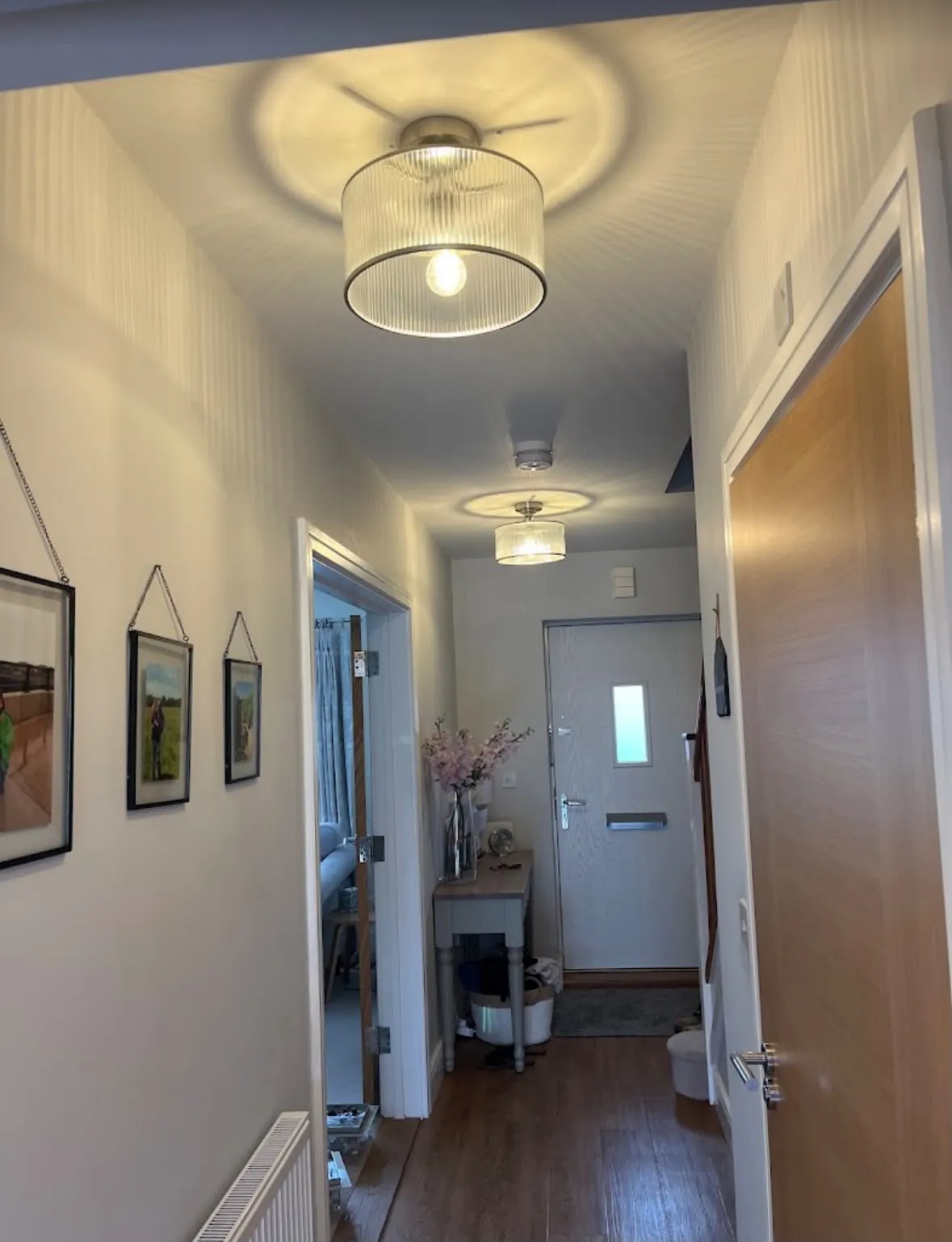 Feature lighting installation in a residential hallway by Sussex Brown Sparks