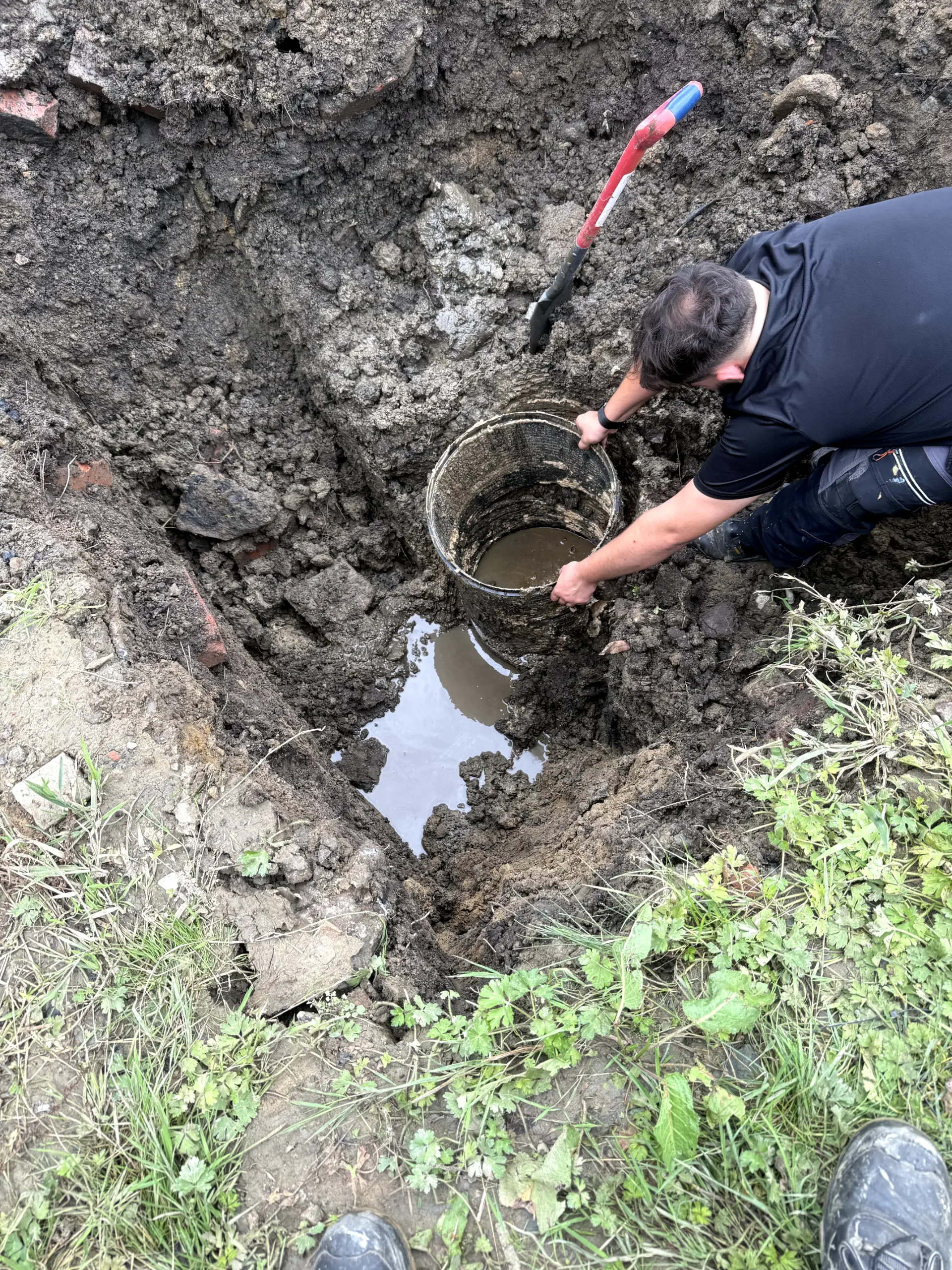 WGS Services engineer performing drain excavation and replacement in Darwen