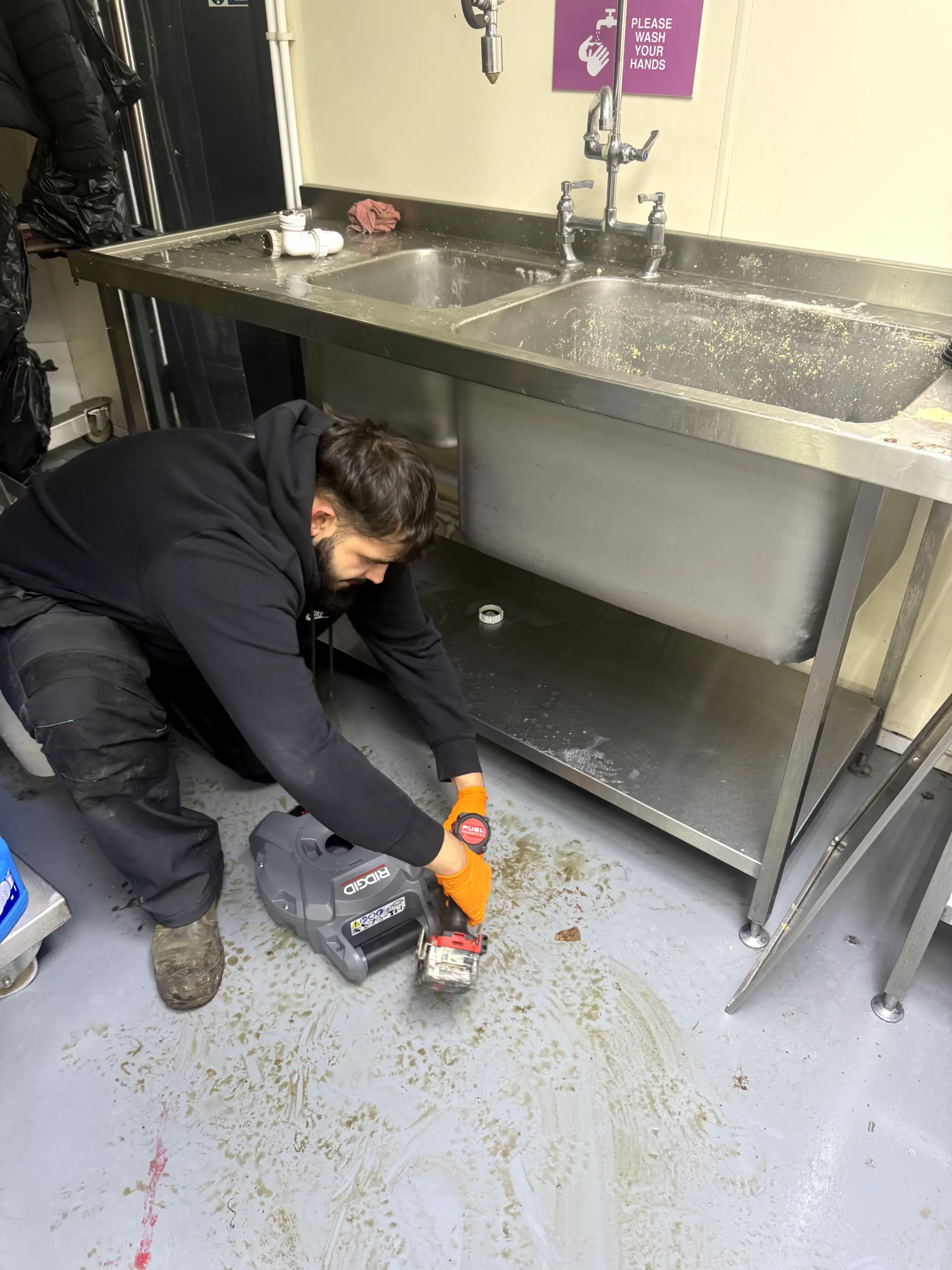 Emergency drain unblocking in a commercial kitchen in Darwen by WGS Services
