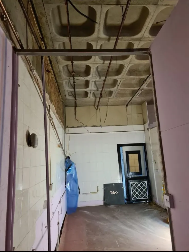 Internal asbestos removal work being carried out in a commercial property by Stay Safe Environmental.