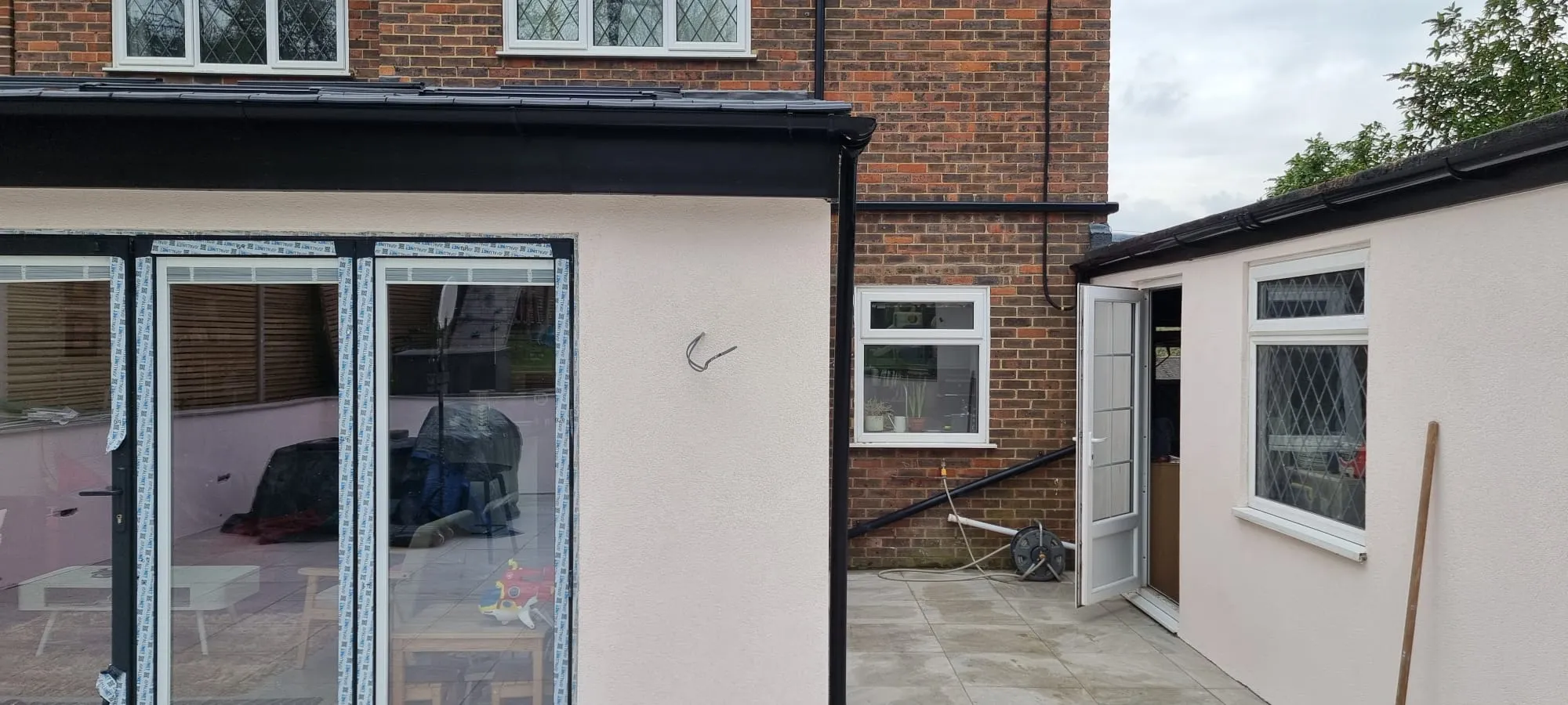 High-quality external rendering on a house extension in Southwick by Portslade Plastering.
