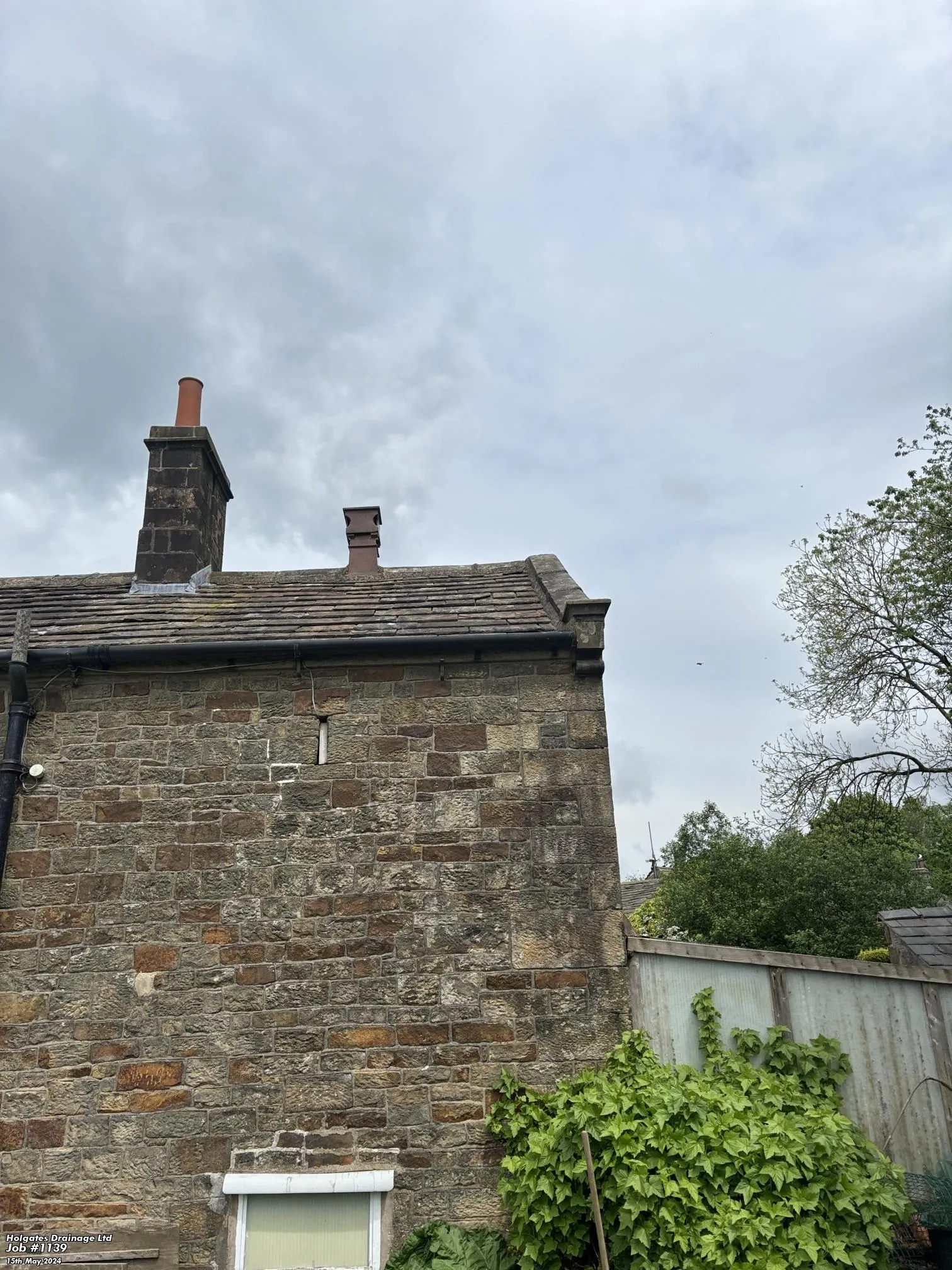 A stone house in Blackburn being surveyed for pest control and proofing entry points by Pest Medic.