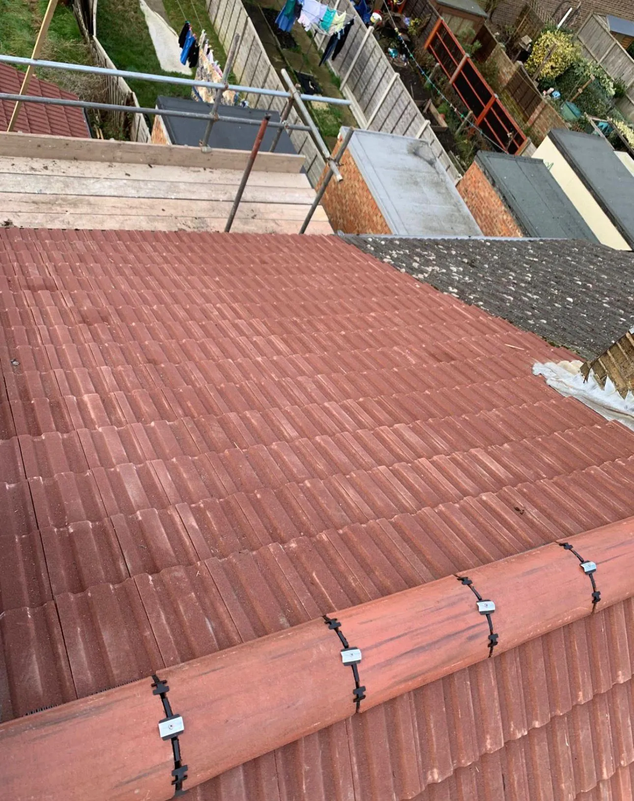 Professional roof tiling installation with a dry ridge system by Century Roofing and Building in Kent.