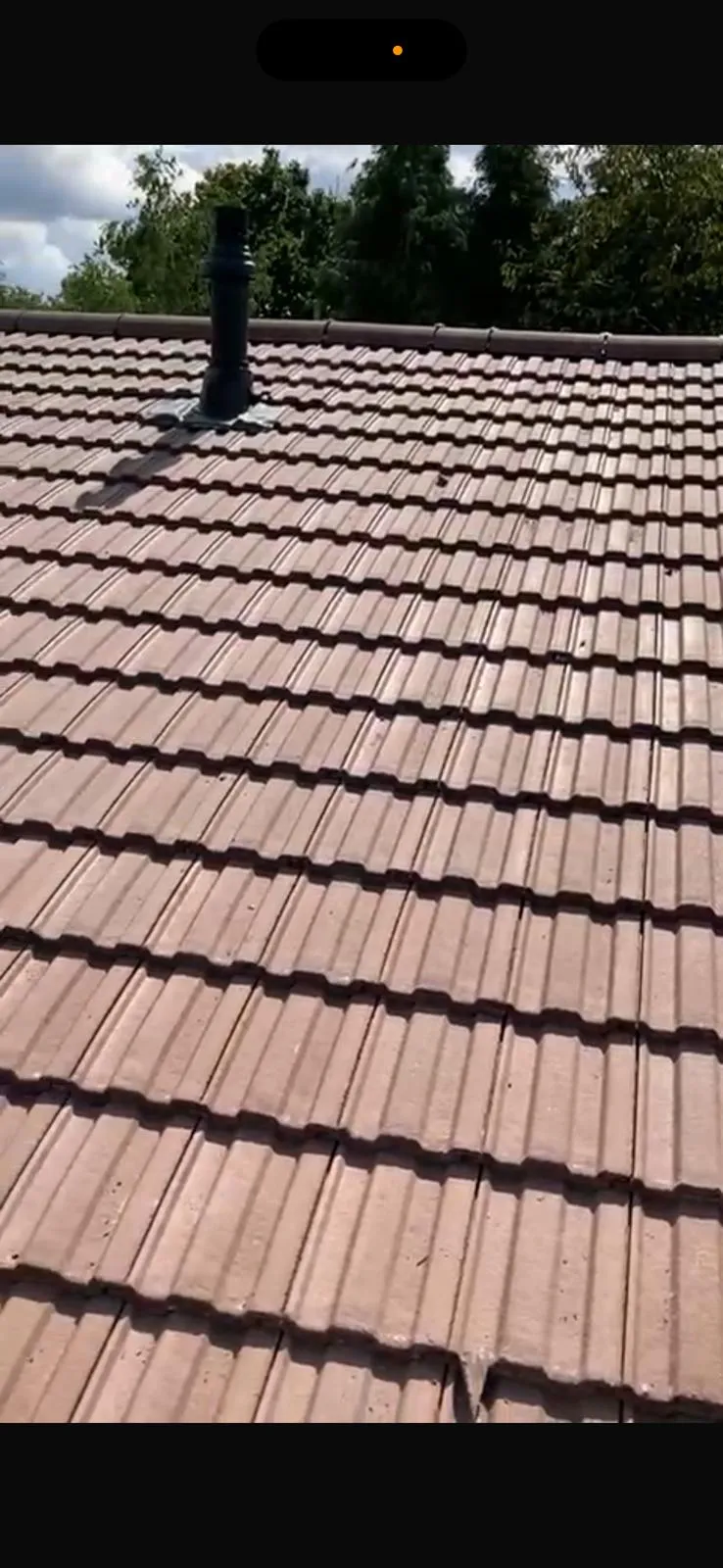 A professionally installed tiled roof with a black vent pipe in West Malling, Kent, by First Choice Roofing Kent.
