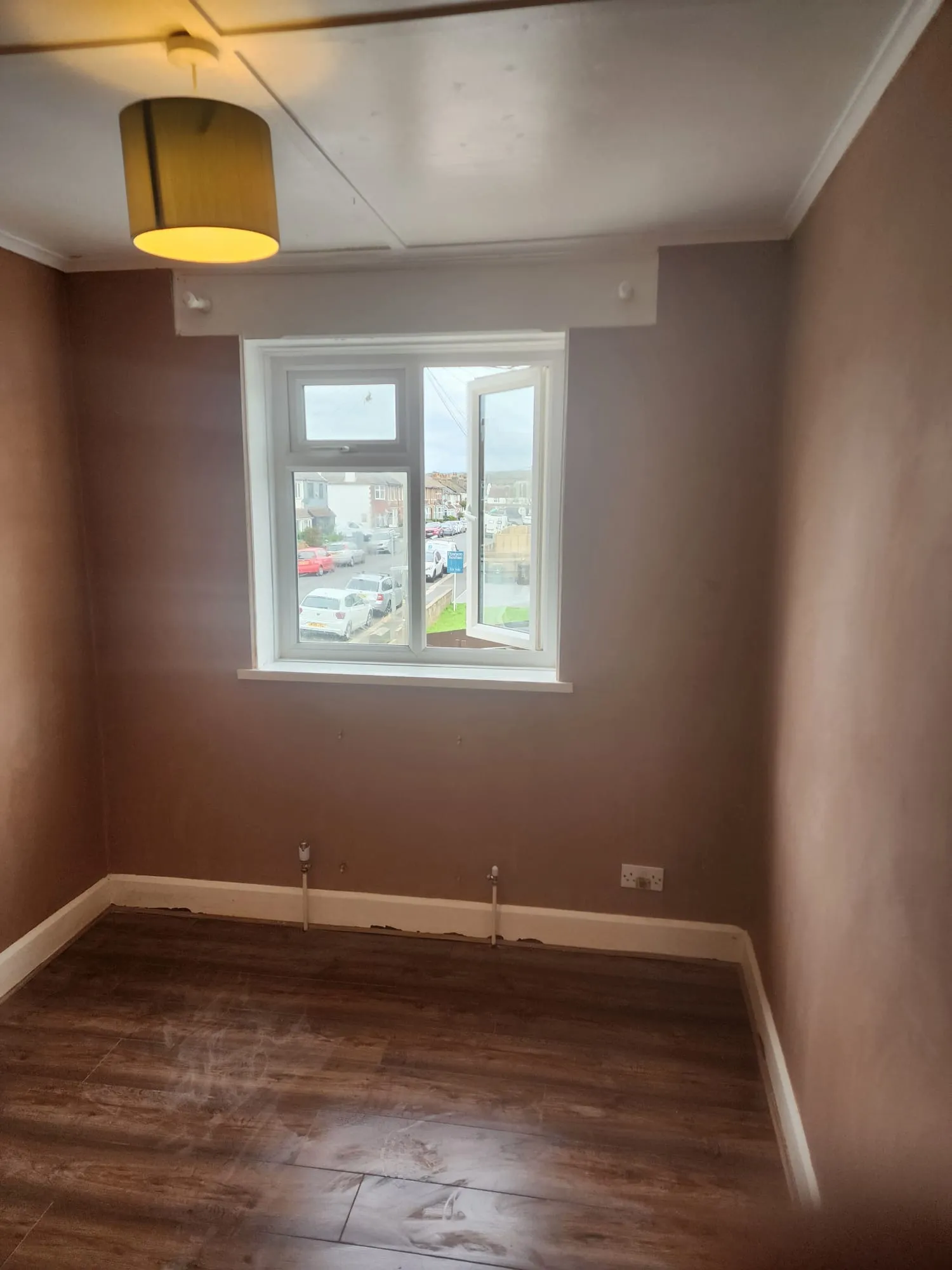 Freshly plastered and skimmed walls in a residential room in Portslade.