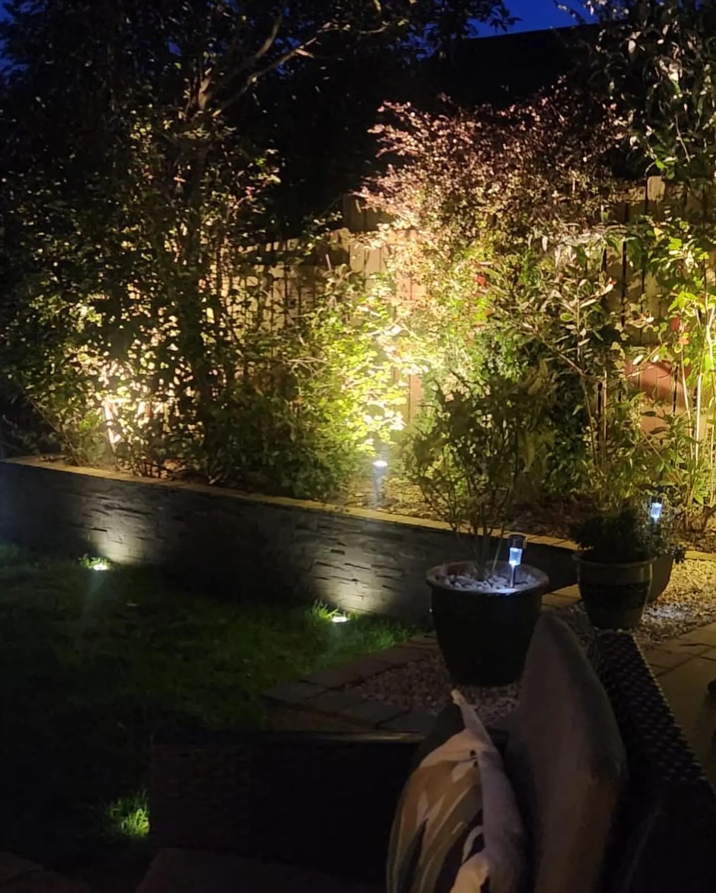 Stunning external garden lighting at dusk reminiscent of rural properties around Lymm Dam