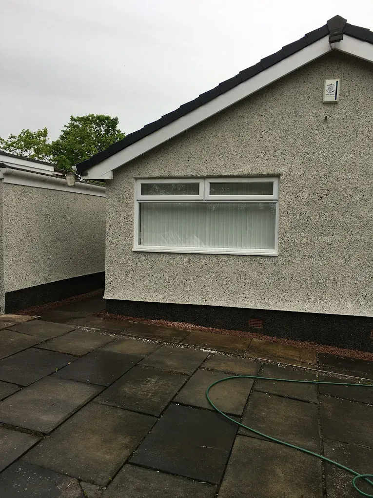 House exterior with professional roughcasting and rendering in Lanark