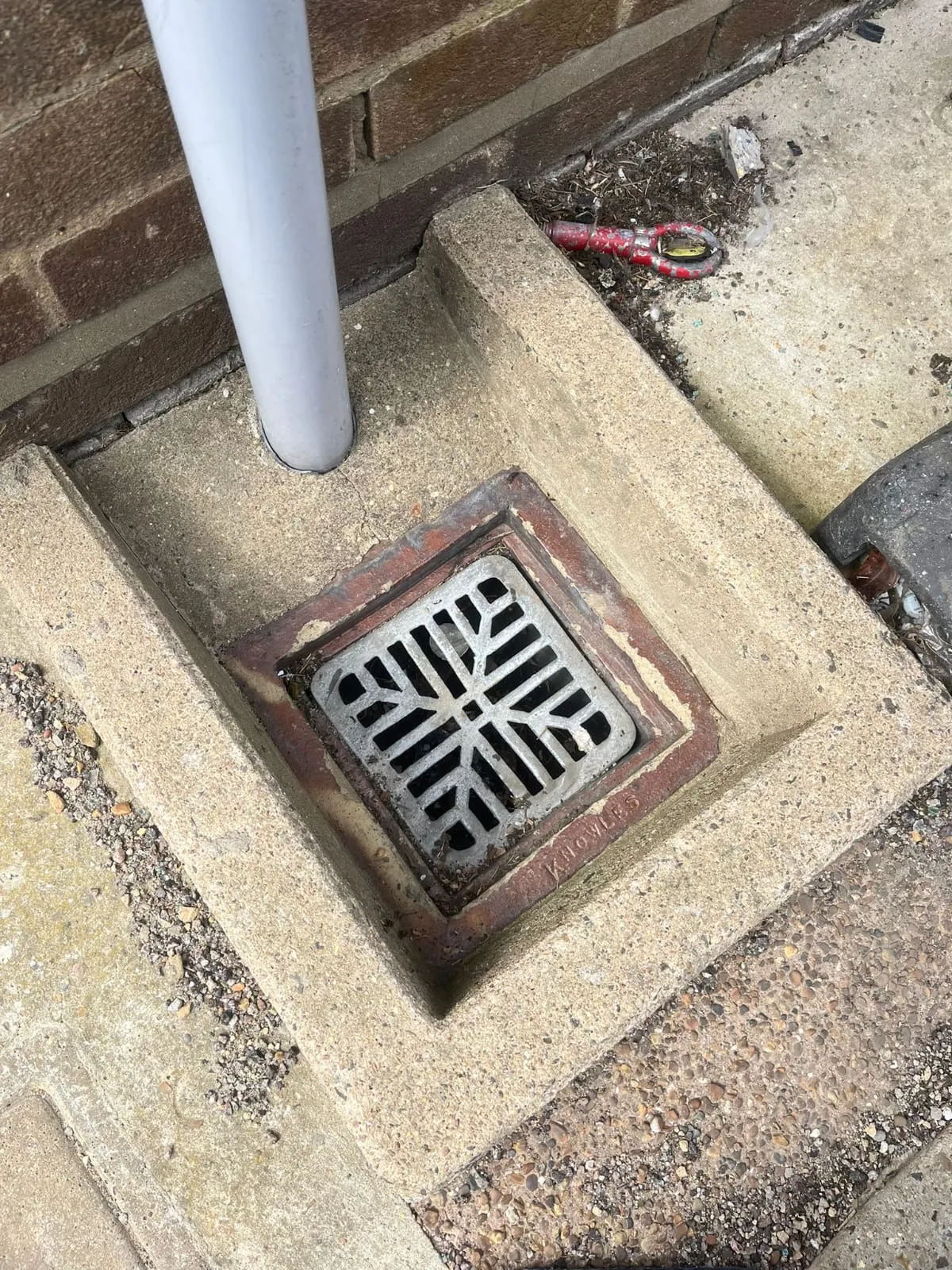 Exterior gully drain and downpipe for drainage services in Felixstowe by FLEX PROPERTY SERVICES.
