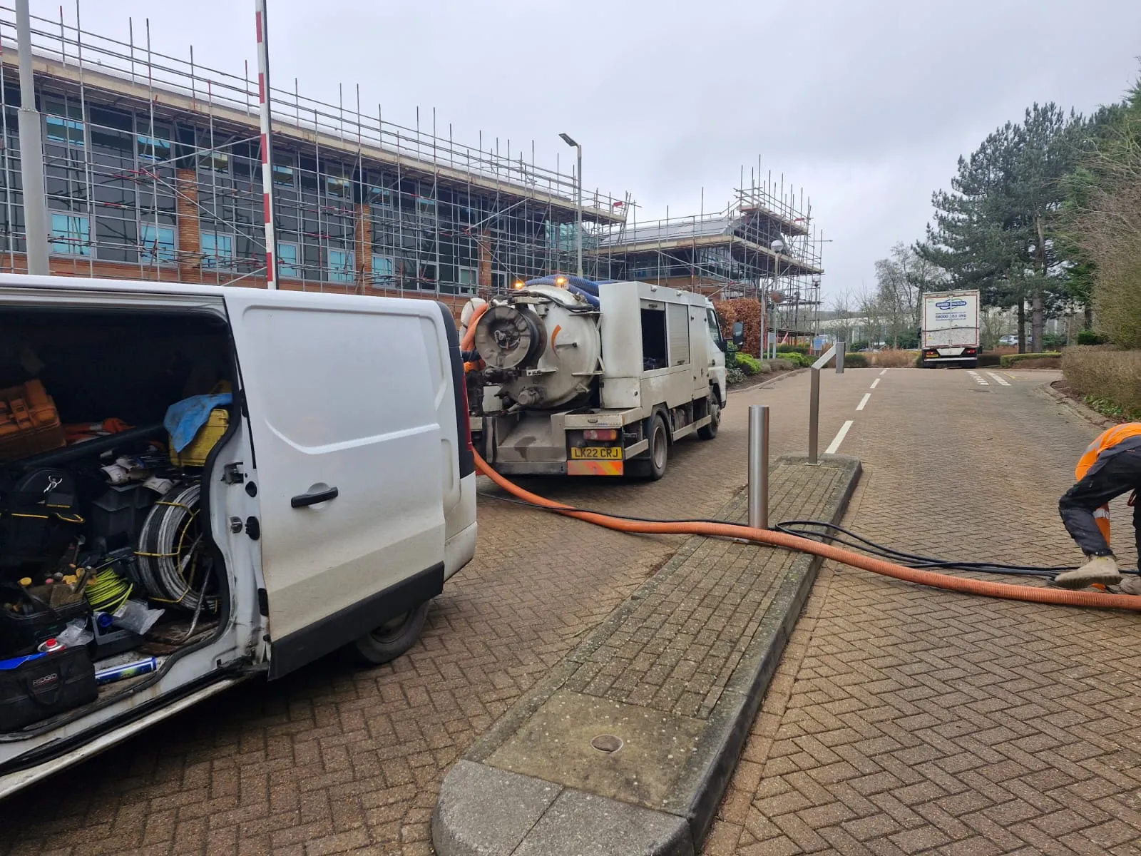 Professional Roberts Drainage Ltd vacuum tanker and service vehicle on a commercial site